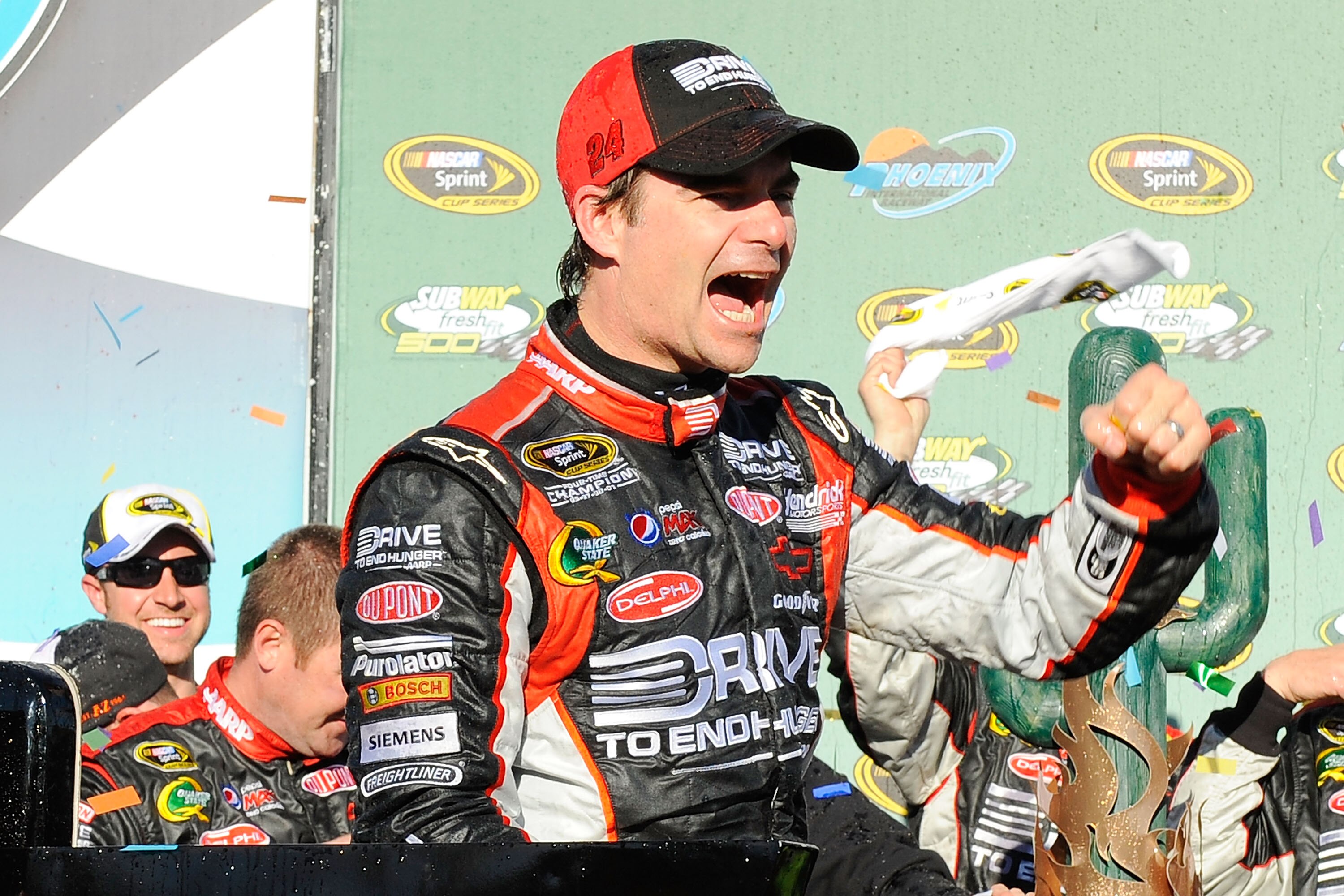 AVONDALE, AZ - FEBRUARY 27:  Jeff Gordon, driver of the #24 Drive to End Hunger Chevrolet, celebrates in victory lane after winning the NASCAR Sprint Cup Series Subway Fresh Fit 500 at Phoenix International Raceway on February 27, 2011 in Avondale, Arizon