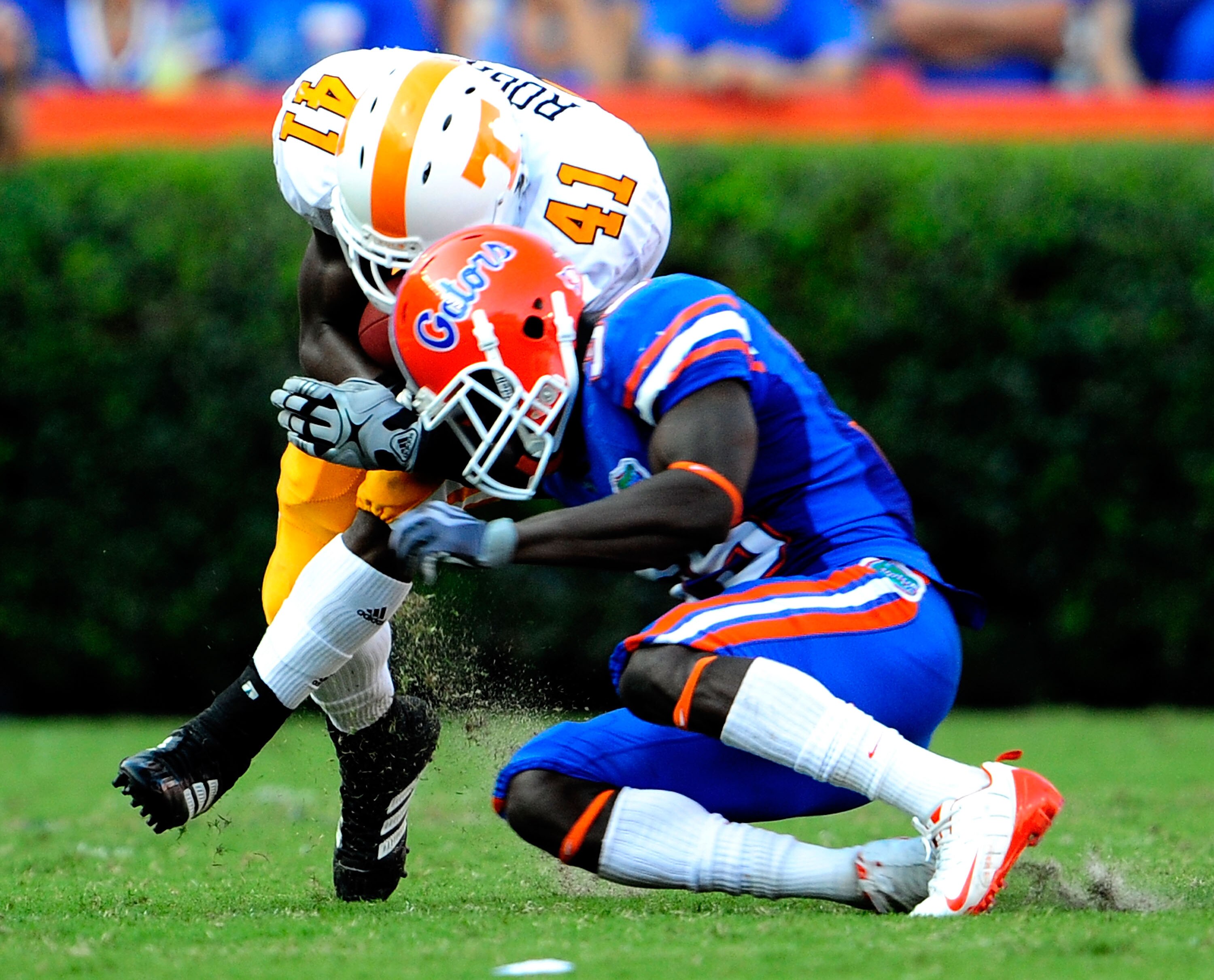 GAINESVILLE, FL - SEPTEMBER 19:  Dennis Rogan #41 of the Tennessee Volunteers is tackled by Ahmad Black #35 of the Florida Gators during the game at Ben Hill Griffin Stadium on September 19, 2009 in Gainesville, Florida.  (Photo by Sam Greenwood/Getty Ima