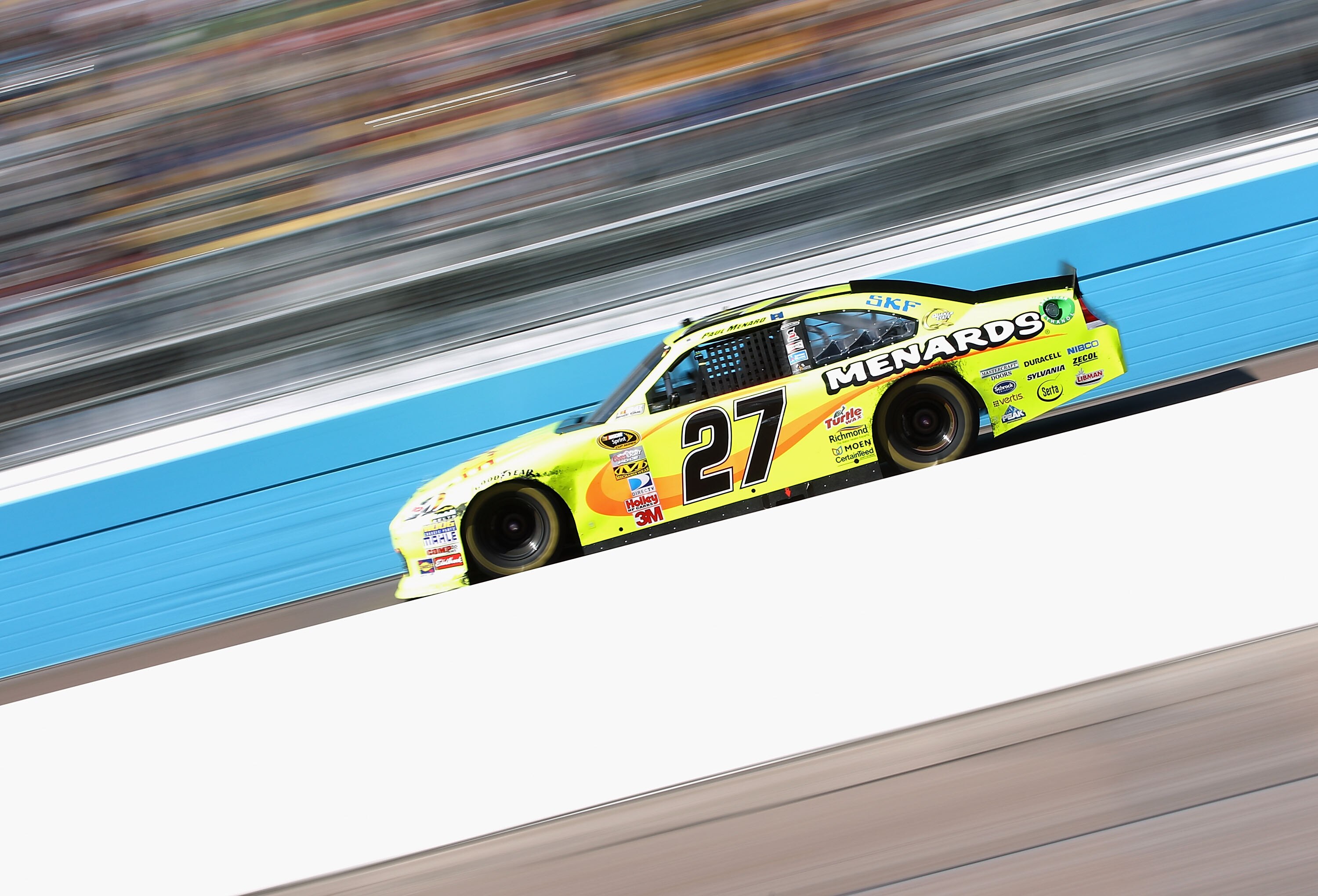 AVONDALE, AZ - FEBRUARY 27:  Paul Menard, driver of the #27 Menards Chevrolet, races during the NASCAR Sprint Cup Series Subway Fresh Fit 500 at Phoenix International Raceway on February 27, 2011 in Avondale, Arizona.  (Photo by Christian Petersen/Getty I