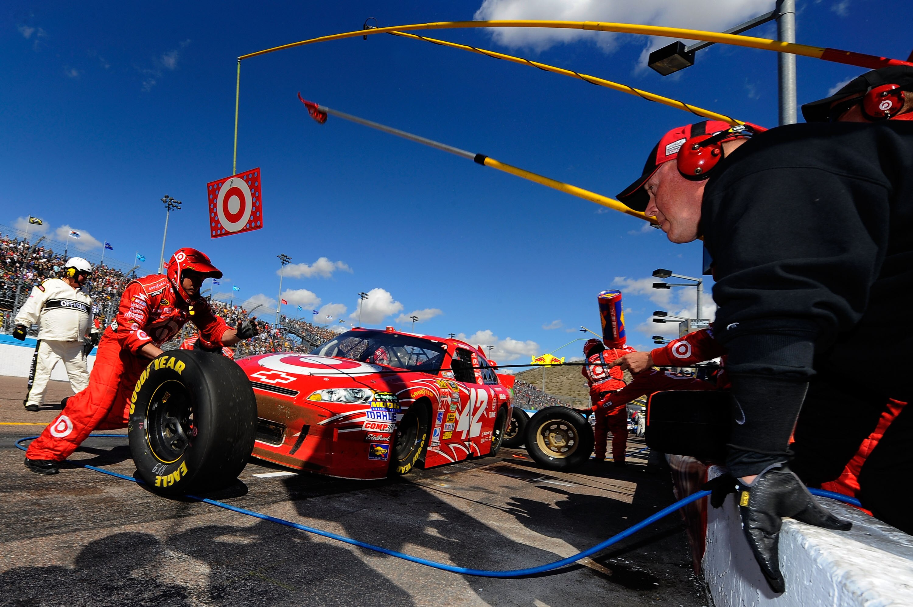 AVONDALE, AZ - FEBRUARY 27:  Juan Pablo Montoya, driver of the #42 Target Chevrolet, makes a pit stop during the NASCAR Sprint Cup Series Subway Fresh Fit 500 at Phoenix International Raceway on February 27, 2011 in Avondale, Arizona.  (Photo by Jared C.