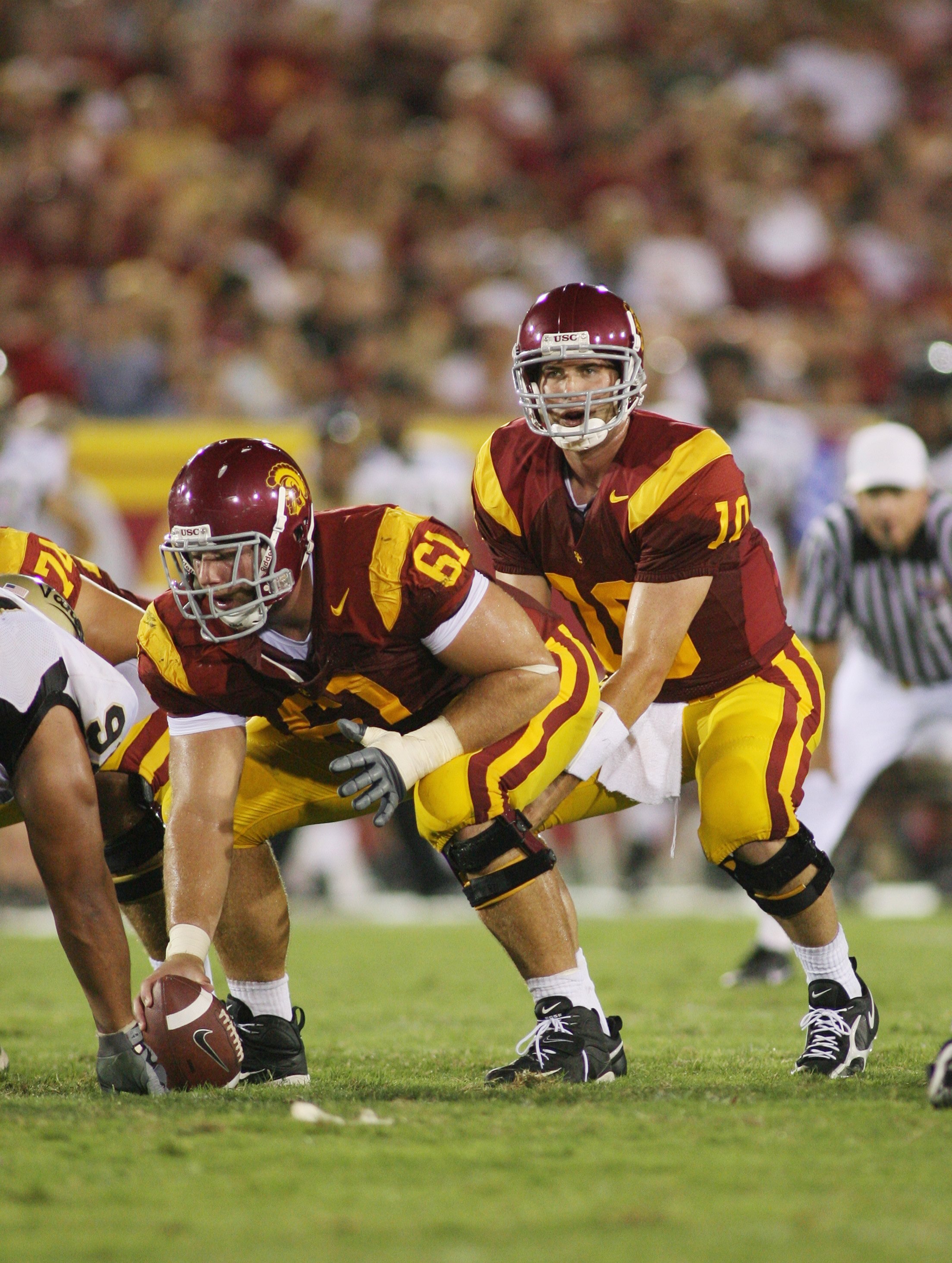LOS ANGELES - SEPTEMBER 1:  John David Booty #10 of the USC Trojans waits for the snap from Kristofer O'Dowd #61 against the University of Idaho Vandals on September 1, 2007 at the Los Angeles Memorial Coliseum in Los Angeles, California.  USC won 38-10.