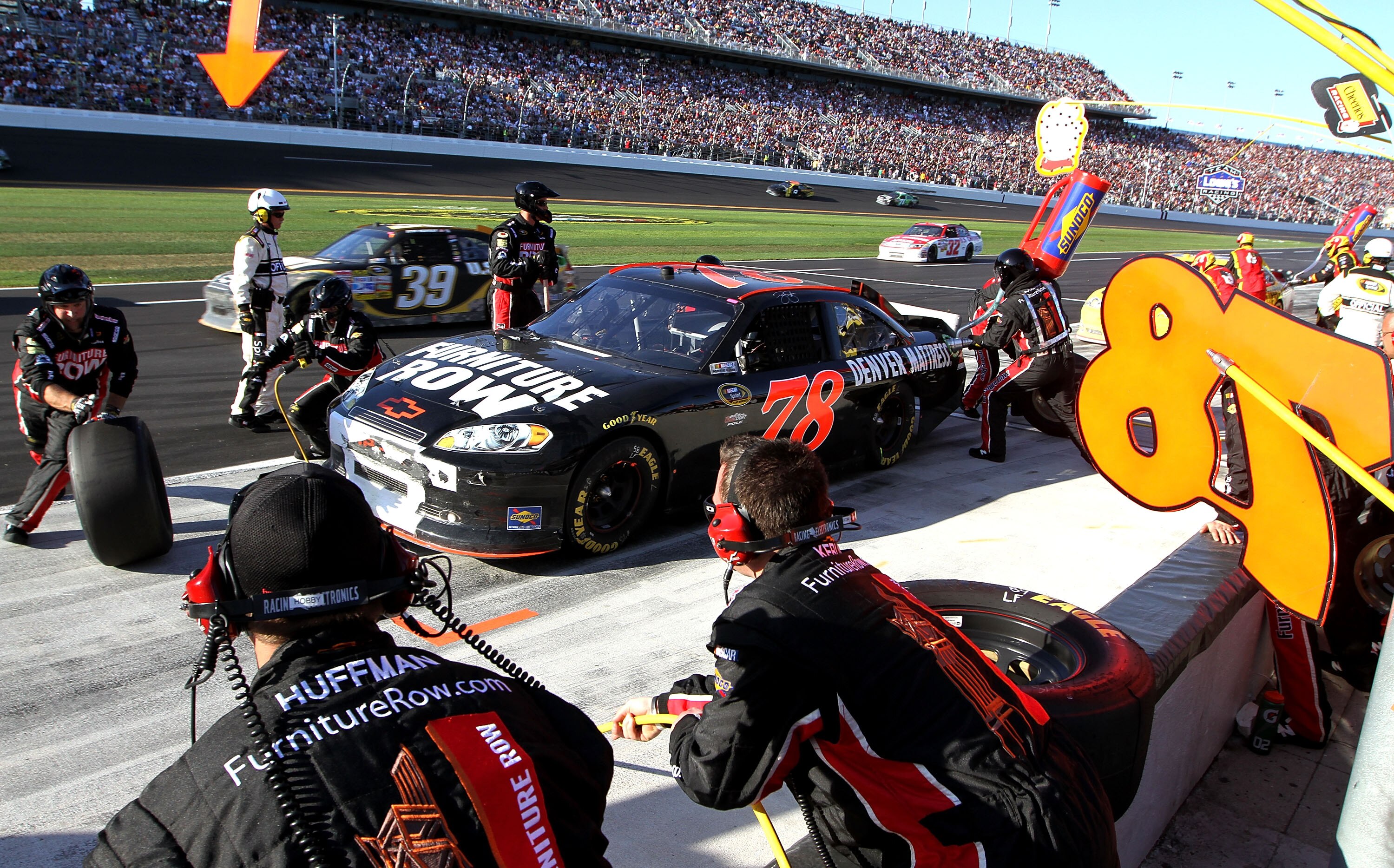 DAYTONA BEACH, FL - FEBRUARY 20:  Regan Smith pits the #78 Furniture Row Racing Chevrolet during the NASCAR Sprint Cup Series Daytona 500 at Daytona International Speedway on February 20, 2011 in Daytona Beach, Florida.  (Photo by Jerry Markland/Getty Ima