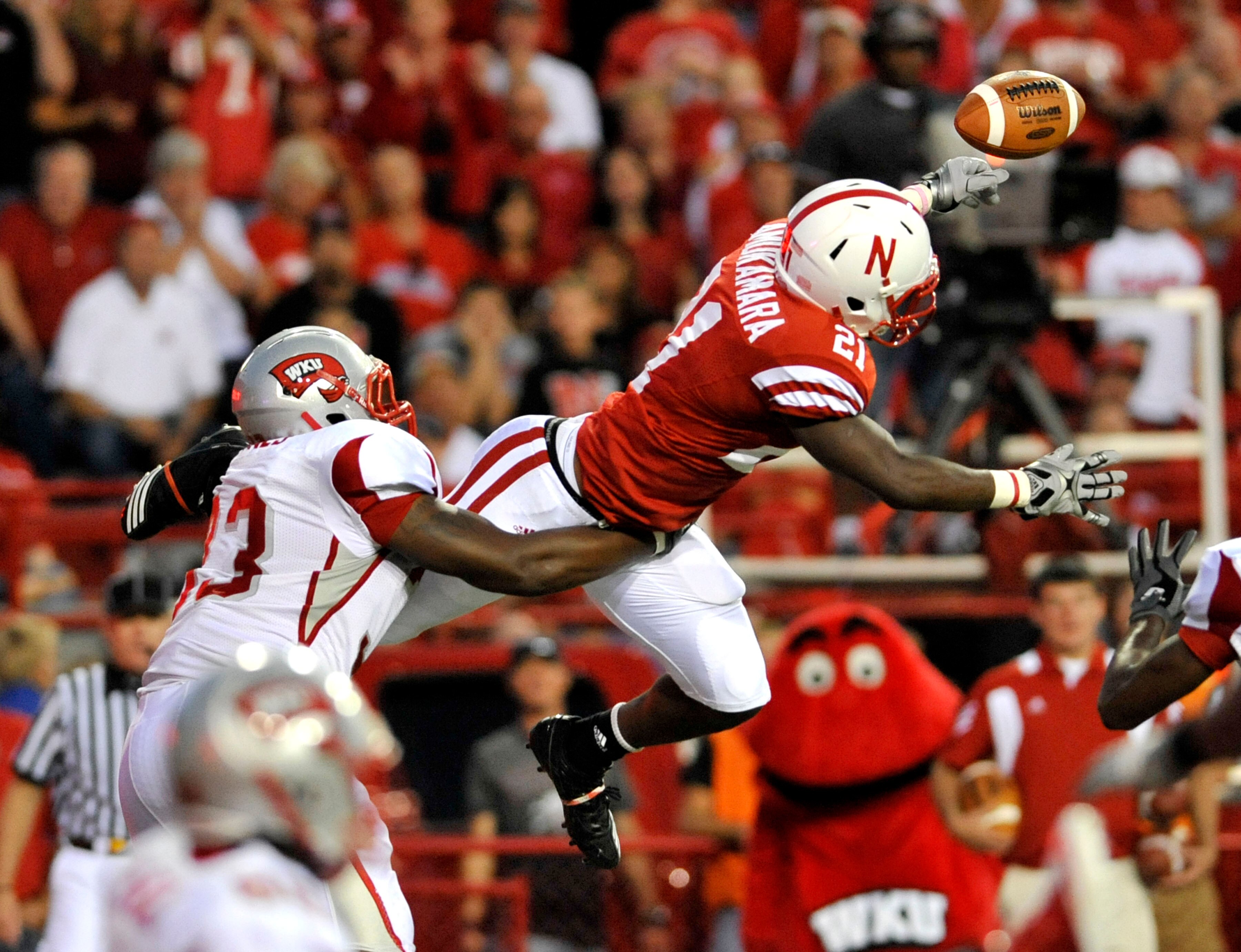 LINCOLN, NE - SEPTEMBER 04: Prince Amukamara #21 of the Nebraska Cornhuskers knocks down a pass intended for Tristan Jones #33 of the Western Kentucky Hilltoppers during second half action of their game against at Memorial Stadium on September 4, 2010 in LINCOLN, NE - SEPTEMBER 04: Prince Amukamara #21 of the Nebraska Cornhuskers knocks down a pass intended for Tristan Jones #33 of the Western Kentucky Hilltoppers during second half action of their game against at Memorial Stadium on September 4, 2010 in