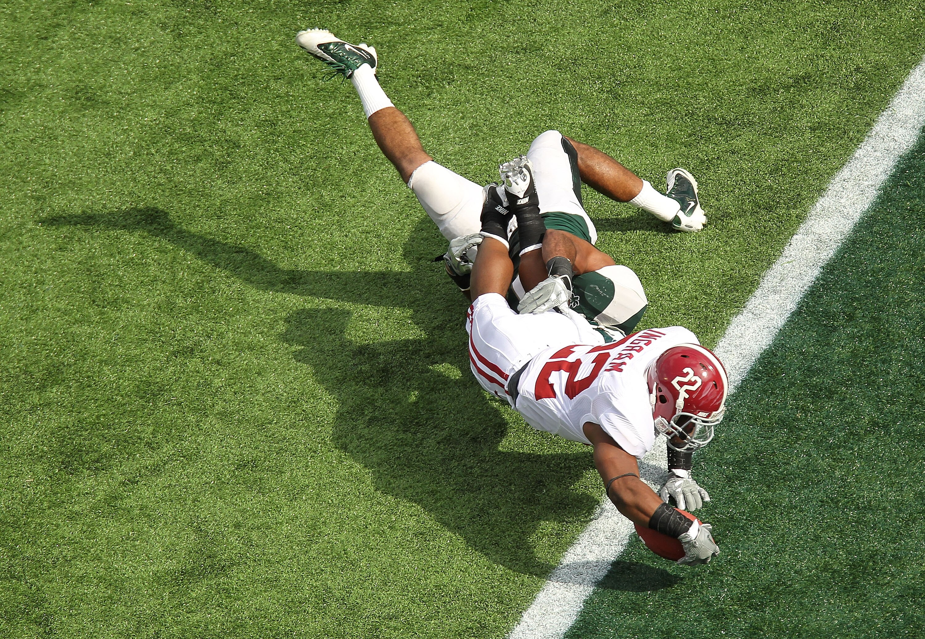 ORLANDO, FL - JANUARY 01: Mark Ingram #22 of the Alabama Crimson Tide scores a touchdown during the Capitol One Bowl against the Michigan State Spartans at the Florida Citrus Bowl on January 1, 2011 in Orlando, Florida. (Photo by Mike Ehrmann/Getty Imag ORLANDO, FL - JANUARY 01: Mark Ingram #22 of the Alabama Crimson Tide scores a touchdown during the Capitol One Bowl against the Michigan State Spartans at the Florida Citrus Bowl on January 1, 2011 in Orlando, Florida. (Photo by Mike Ehrmann/Getty Imag