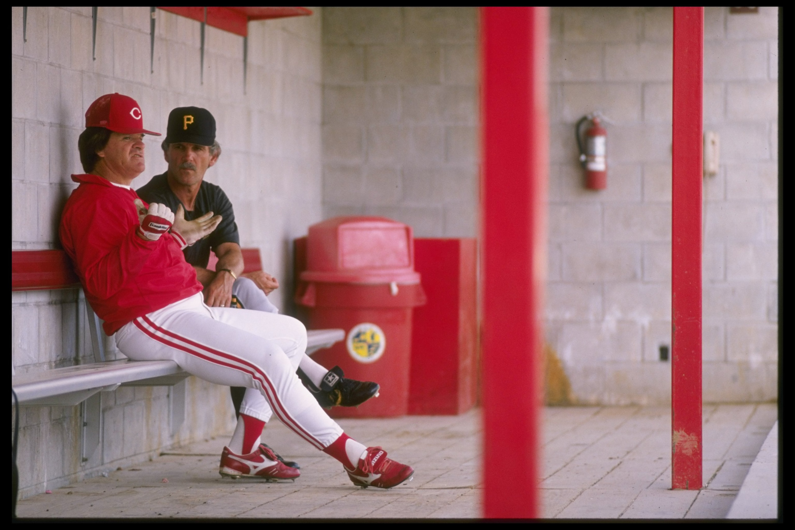 1990:  Pete Rose of the Cincinnati Reds sitting on a bench during a game. Mandatory Credit: Allen Dean Steele  /Allsport