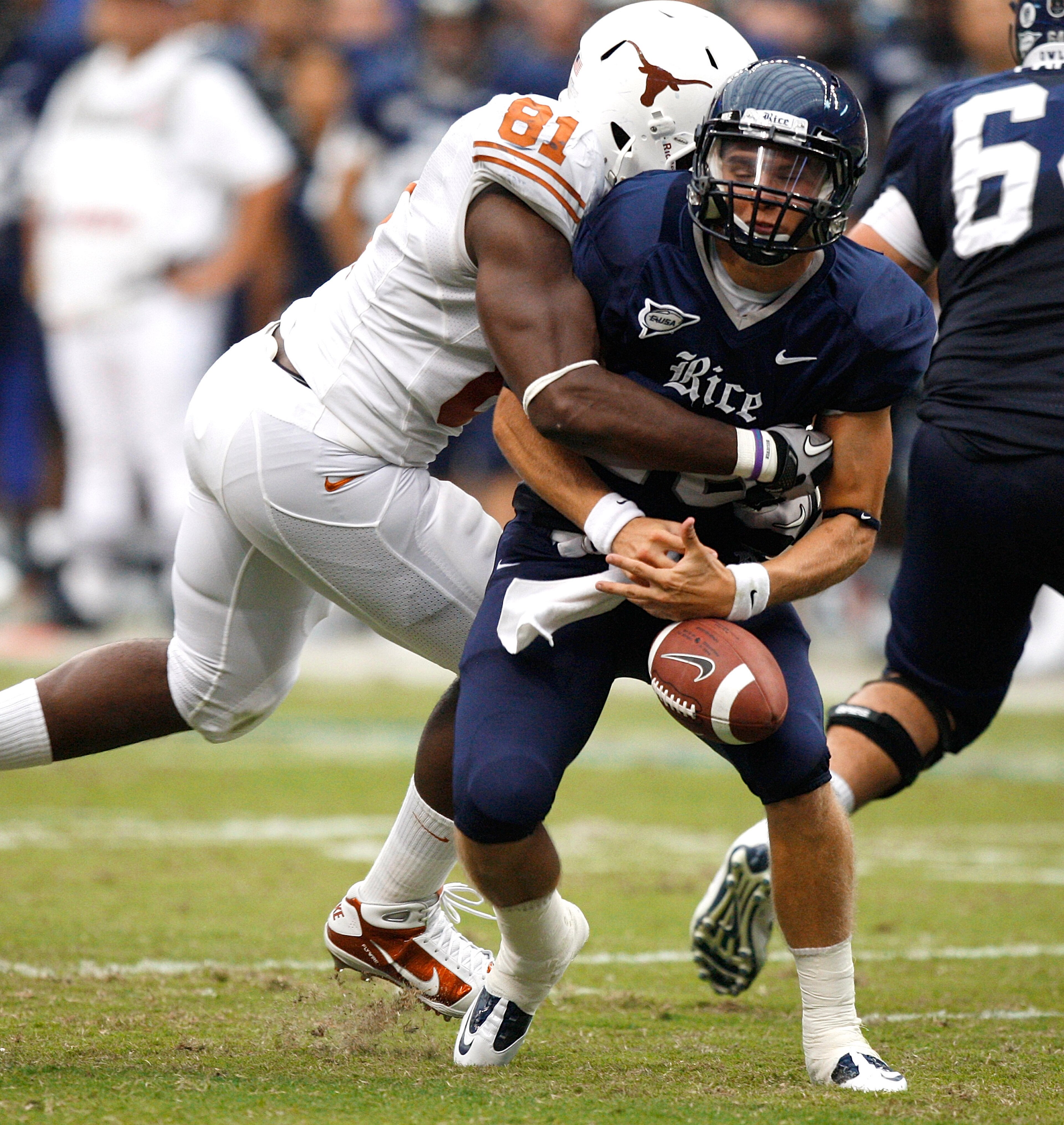 HOUSTON - SEPTEMBER 04:  Quarterback Taylor McHargue #16 of the Rice Owls loses the ball after he is sacked by defensive end Sam Acho #81 of the Texas Longhorns at Reliant Stadium on September 4, 2010 in Houston, Texas. Texas recovered the fumble and scor