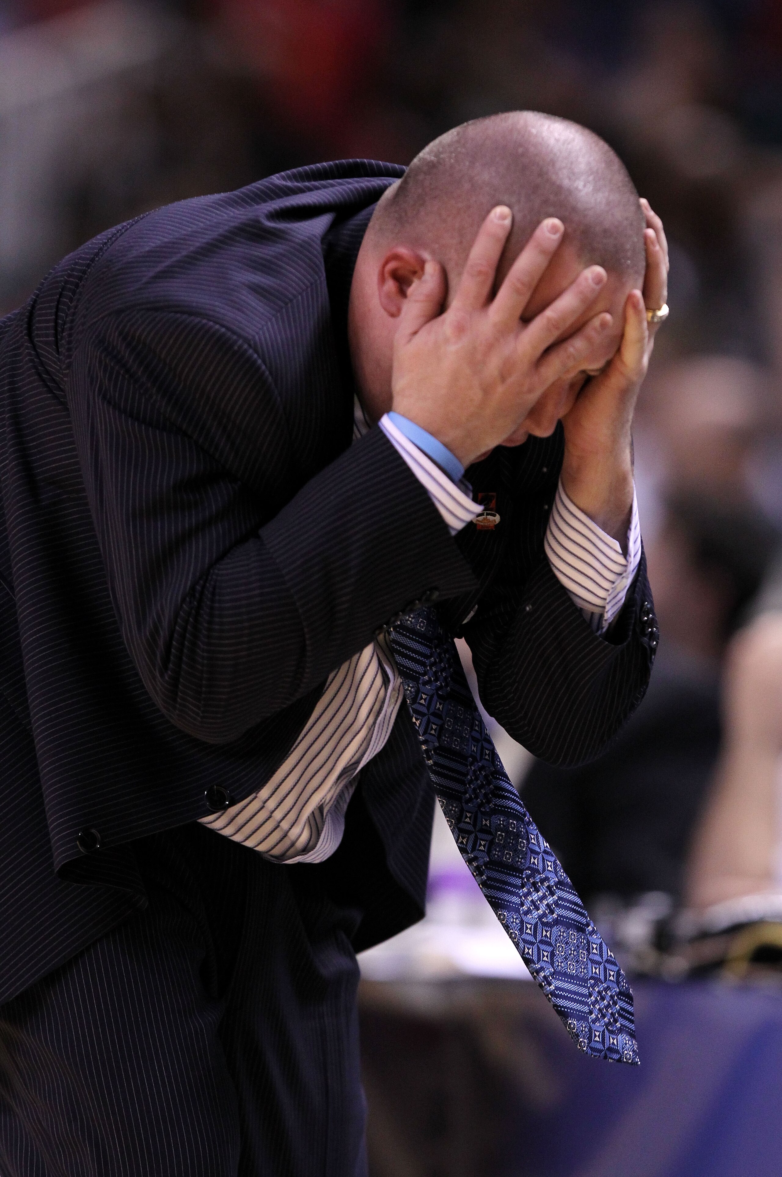 SAN JOSE, CA - MARCH 18:  Head coach Buzz Williams of the Marquette Golden Eagles reacts to a play during their game against the Washington Huskies in the first round of the 2010 NCAA men's basketball tournament at HP Pavilion on March 18, 2010 in San Jos