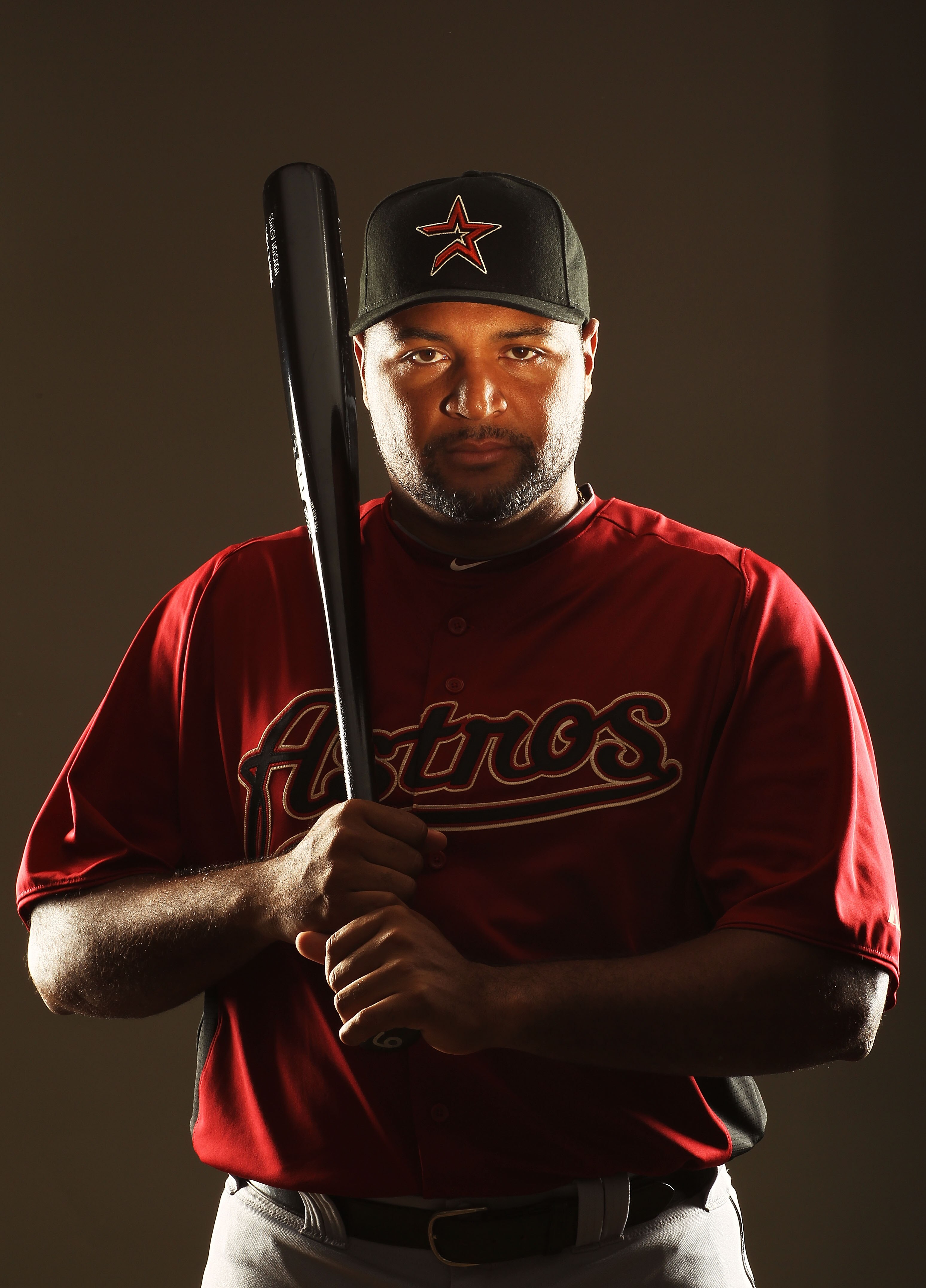 KISSIMMEE, FL - FEBRUARY 24:  Carlos Lee #45 of the Houston Astros poses for a portrait Spring Training photo Day at Osceola County Stadium  on February 24, 2011 in Kissimmee, Florida.  (Photo by Al Bello/Getty Images)