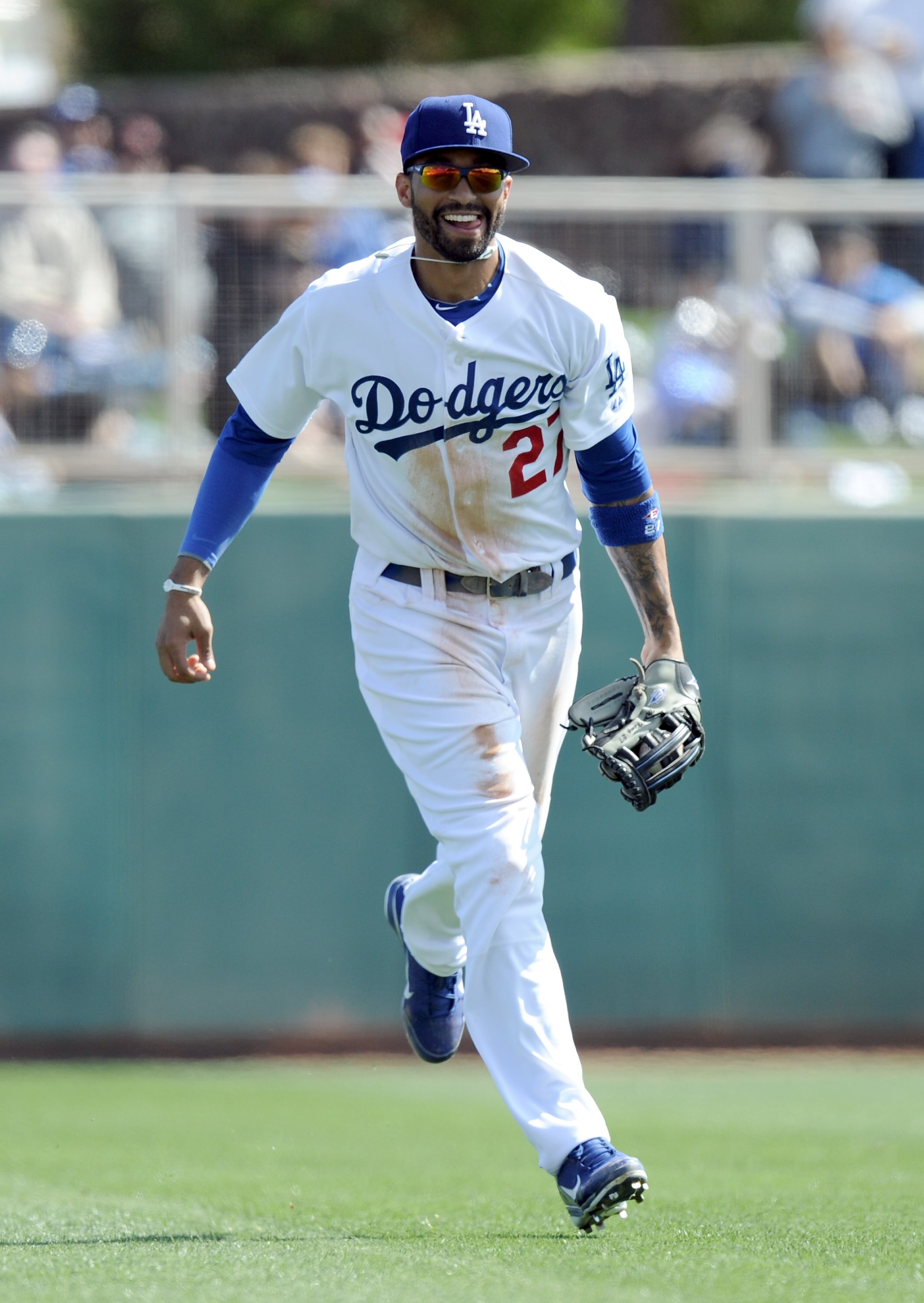 PHOENIX, AZ - FEBRUARY 27:  Matt Kemp #27 of the Los Angeles Dodgers smiles as he leaves the field during spring training at Camelback Ranch on February 27, 2011 in Phoenix, Arizona.  (Photo by Harry How/Getty Images)
