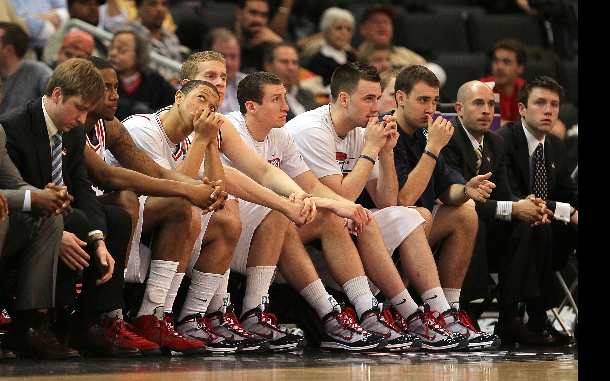 PROVIDENCE, RI - MARCH 18:  The bench of the Richmond Spiders reacts in the final moments of a 80-71 loss to the Saint Mary's Gaels during the first round of the 2010 NCAA men's basketball tournament at Dunkin' Donuts Center on March 18, 2010 in Providenc