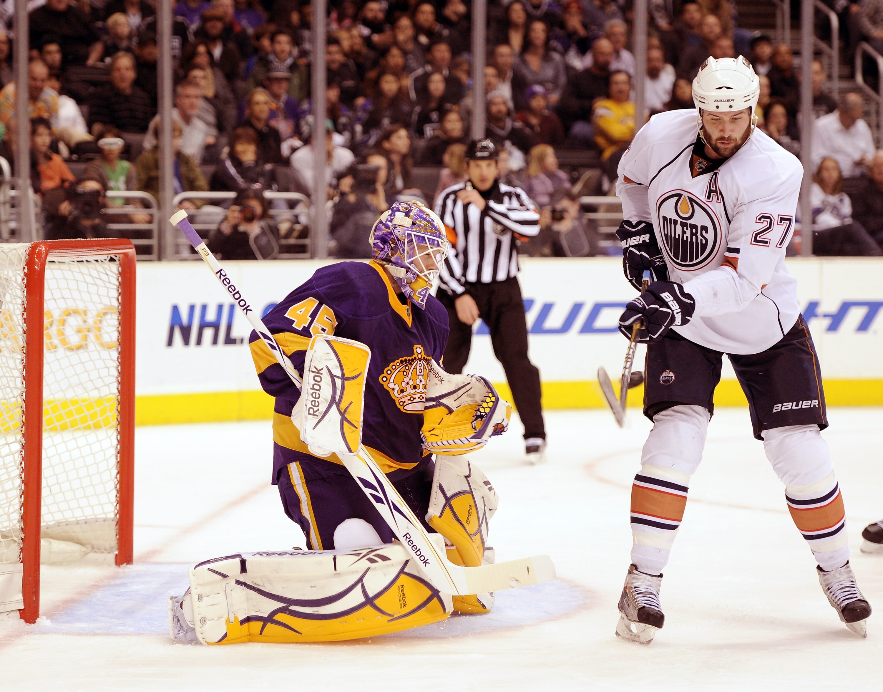 LOS ANGELES, CA - JANUARY 15:  Dustin Penner #27 of the Edmonton Oilers attempts a deflection on Jonathan Bernier #45 of the Los Angeles Kings at the Staples Center on January 15, 2011 in Los Angeles, California.  (Photo by Harry How/Getty Images)