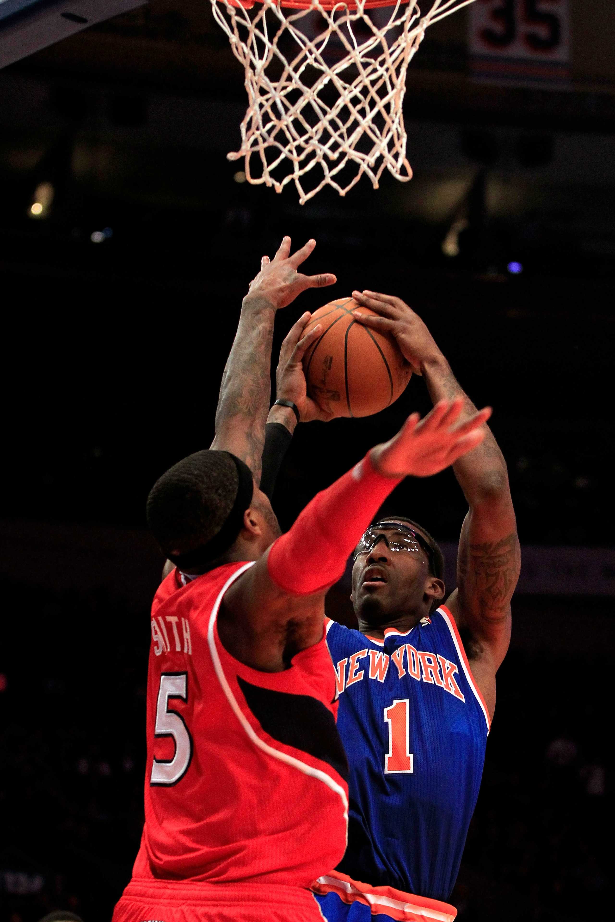 NEW YORK, NY - FEBRUARY 16:  Amar'e Stoudemire #1 of the New York Knicks shoots the ball over Josh Smith #5 of the Atlanta Hawks at Madison Square Garden on February 16, 2011 in New York City. NOTE TO USER: User expressly acknowledges and agrees that, by