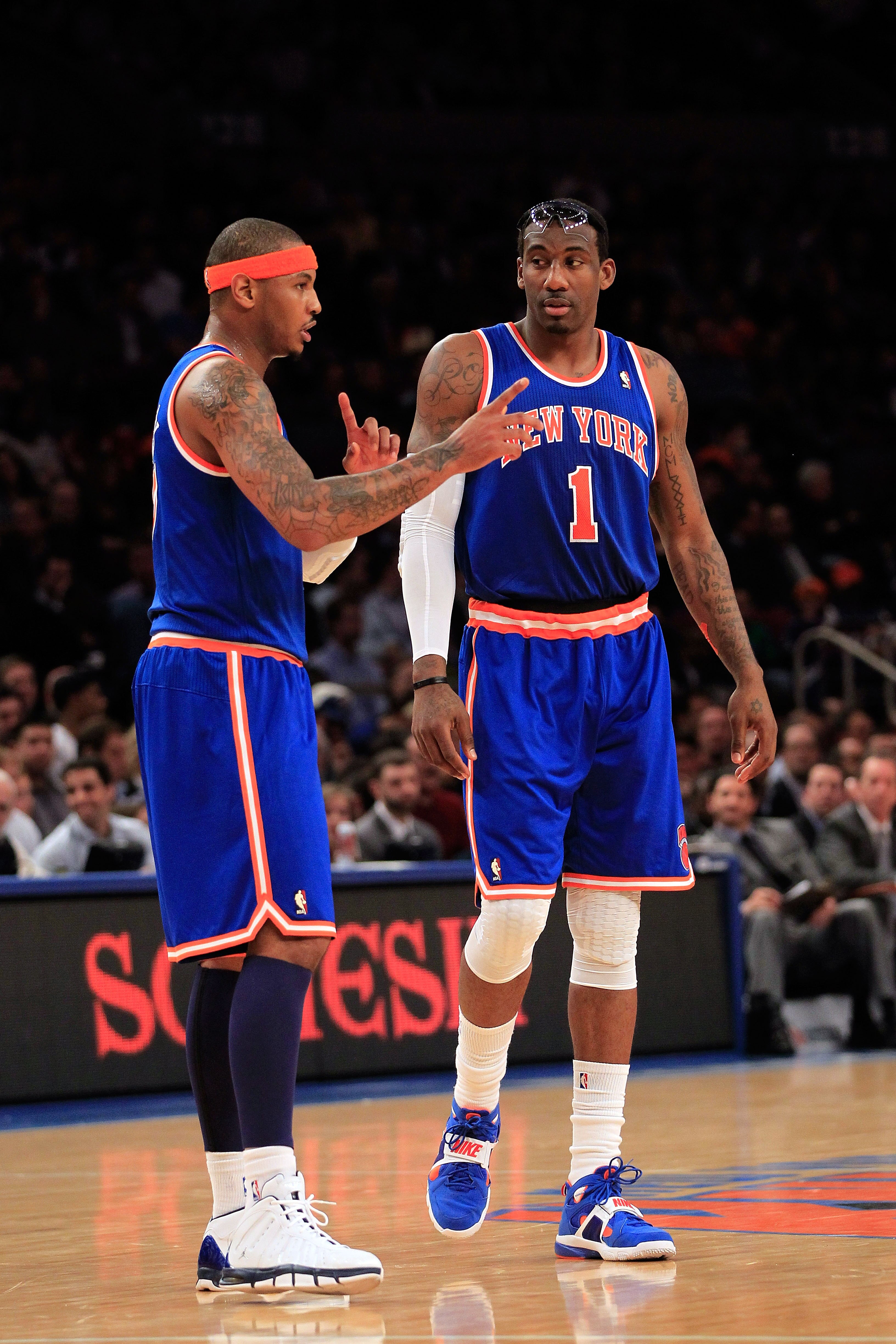NEW YORK, NY - FEBRUARY 23: (L-R) Carmelo Anthony #7 and Amar'e Stoudemire #1 of the New York Knicks discuss tactics on the court against the Milwaukee Bucks at Madison Square Garden on February 23, 2011 in New York City. NOTE TO USER: User expressly ackn NEW YORK, NY - FEBRUARY 23: (L-R) Carmelo Anthony #7 and Amar'e Stoudemire #1 of the New York Knicks discuss tactics on the court against the Milwaukee Bucks at Madison Square Garden on February 23, 2011 in New York City. NOTE TO USER: User expressly ackn