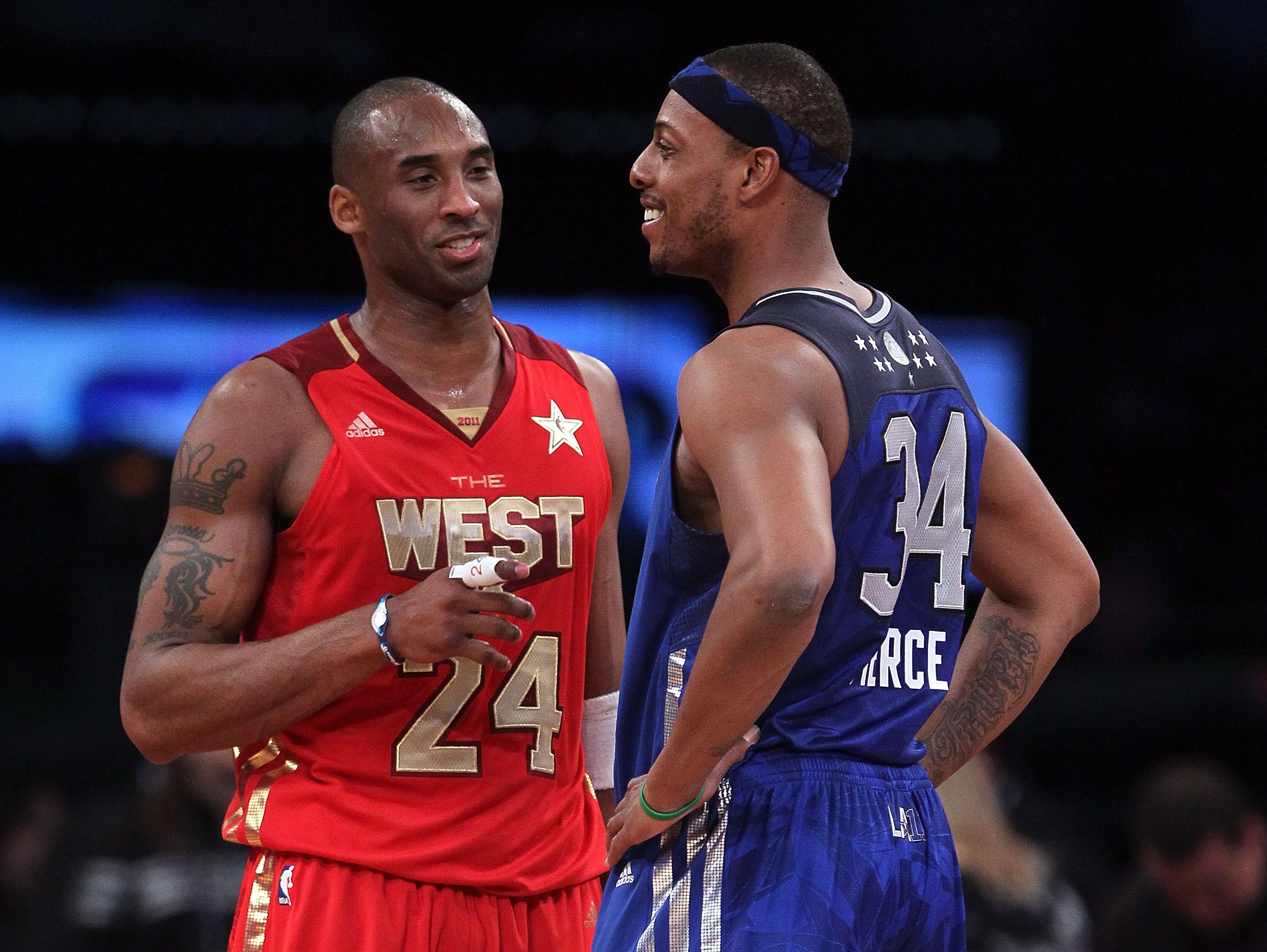 LOS ANGELES, CA - FEBRUARY 20:  Kobe Bryant #24 of the Los Angeles Lakers and the Western Conference stands with Paul Pierce #34 of the Boston Celtics and the Eastern Conference in the 2011 NBA All-Star Game at Staples Center on February 20, 2011 in Los A