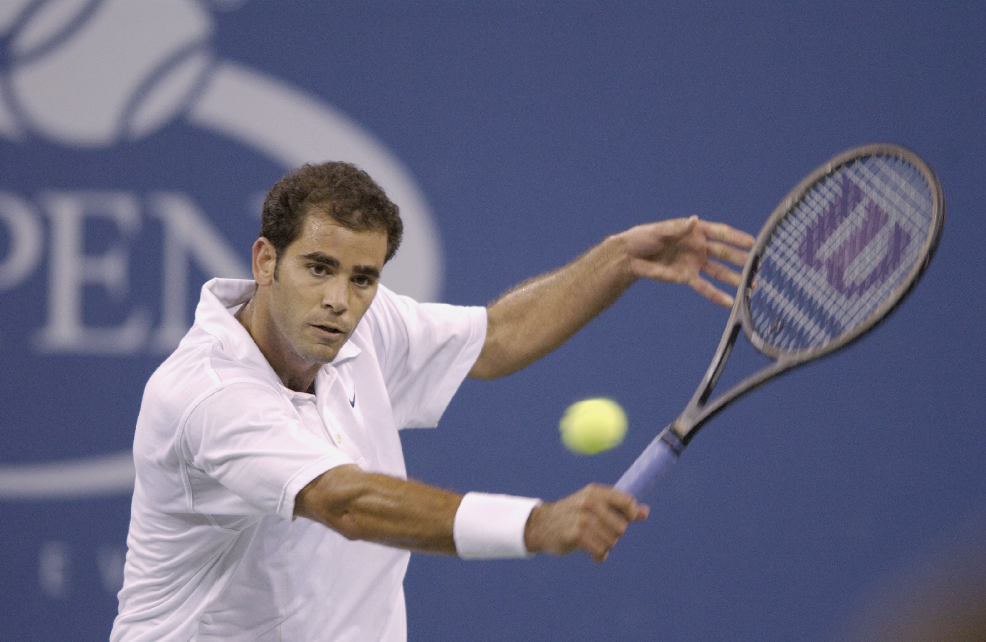 FLUSHING-SEPTEMBER 5: Pete Sampras (USA)hits a backhand against  Andre Agassi (USA)  during the US Open at the USTA National Tennis Center on September 5, 2001 in Flushing Meadows Corona Park in Flushing, New York.  (Photo by Clive Brunskill/Getty Images)