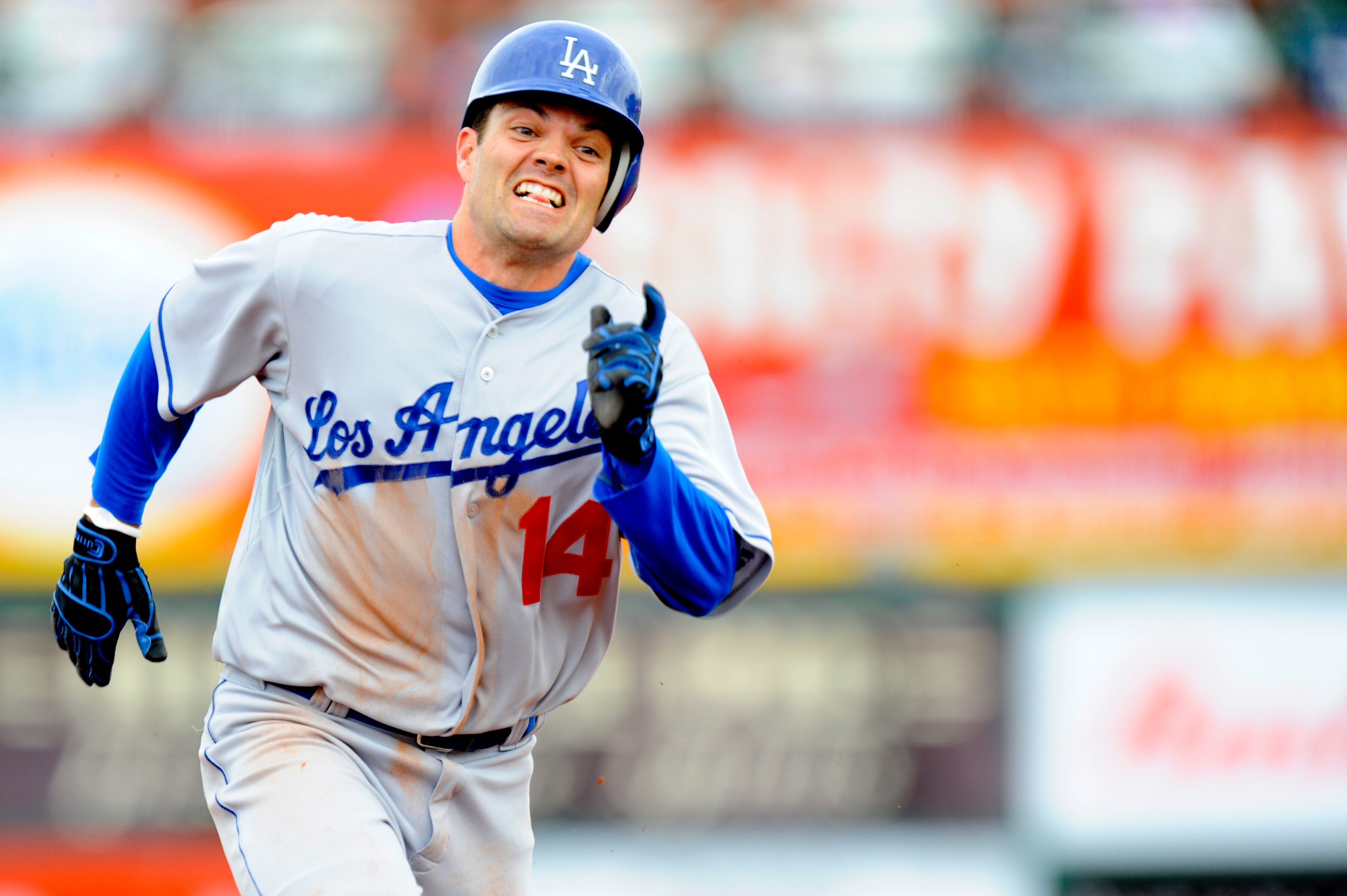 SCOTTSDALE, AZ - FEBRUARY 26: Jamey Carroll #14 of the Los Angeles Dodgers runs the bases during a spring training game at Scottsdale Stadium on February 26, 2011 in Scottsdale, Arizona. (Photo by Rob Tringali/Getty Images)