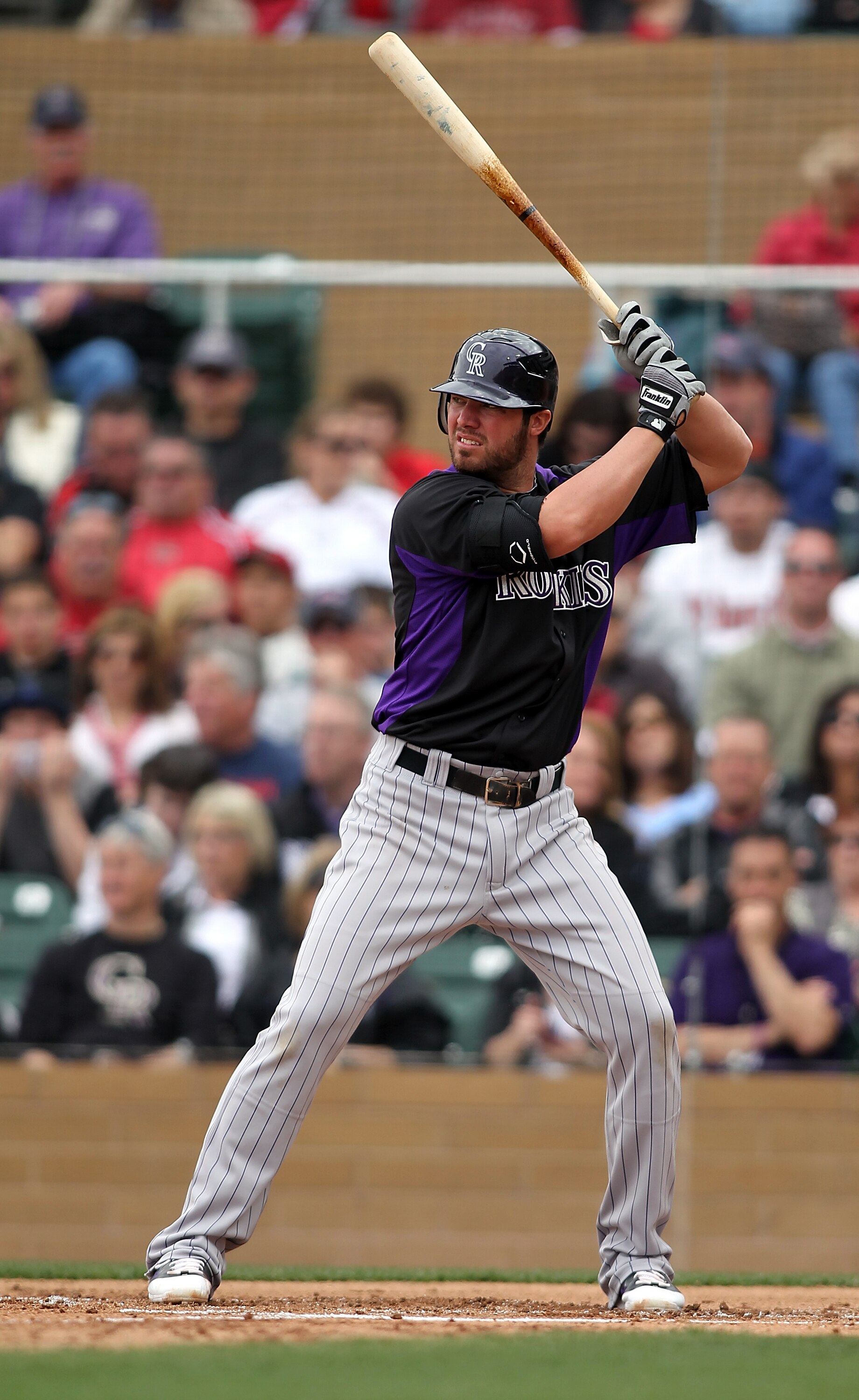 SCOTTSDALE, AZ - FEBRUARY 26:  Ian Stewart #9 of the Colorado Rockies swings during the game against the Arizona Diamondbacks at Salt River Fields on February 26, 2011in Scottsdale, Arizona..  (Photo by Jonathan Ferrey/Getty Images)