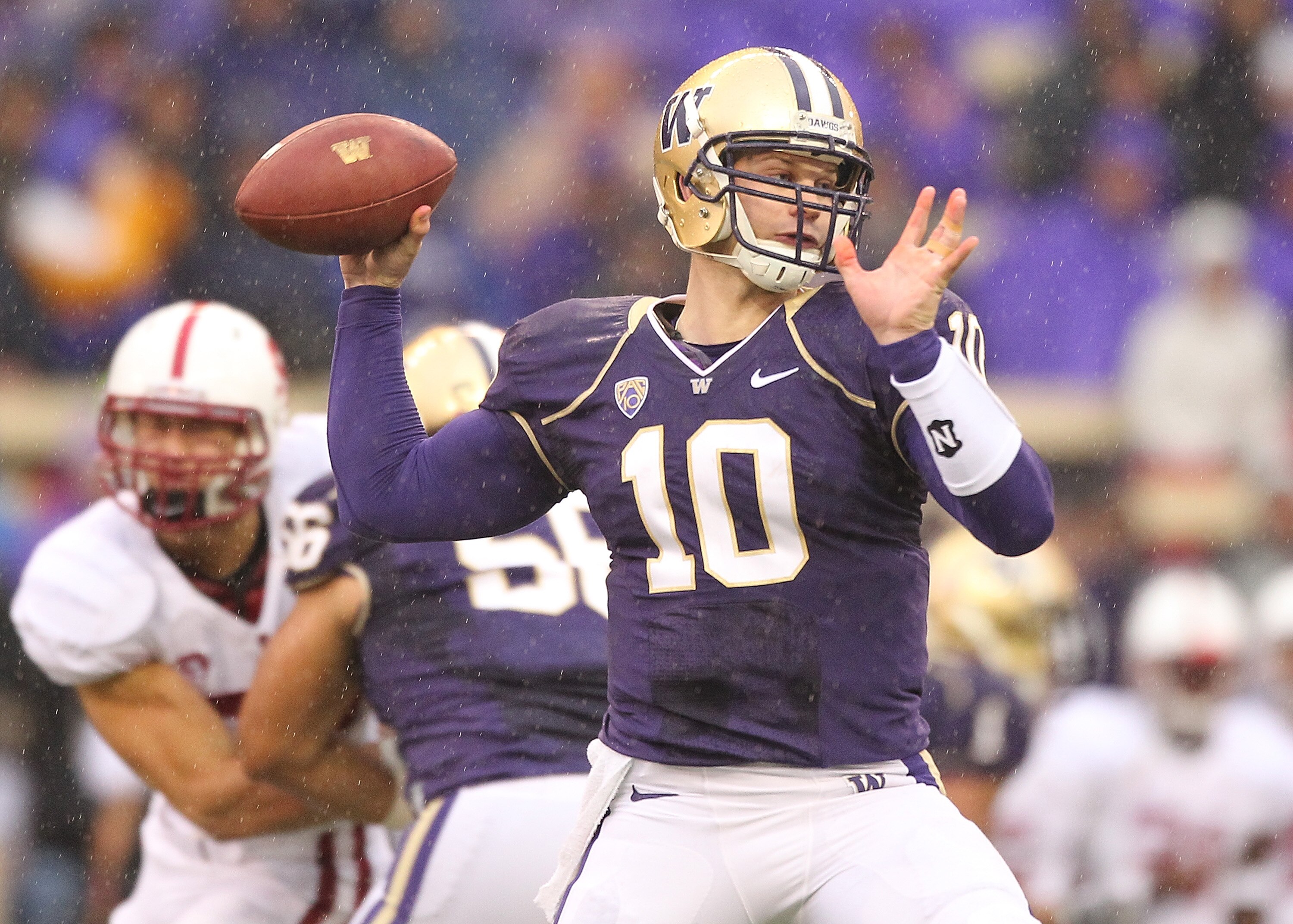SEATTLE - OCTOBER 30: Quarterback Jake Locker #10 of the Washington Huskies passes against the Stanford Cardinal on October 30, 2010 at Husky Stadium in Seattle, Washington. (Photo by Otto Greule Jr/Getty Images) SEATTLE - OCTOBER 30: Quarterback Jake Locker #10 of the Washington Huskies passes against the Stanford Cardinal on October 30, 2010 at Husky Stadium in Seattle, Washington. (Photo by Otto Greule Jr/Getty Images)