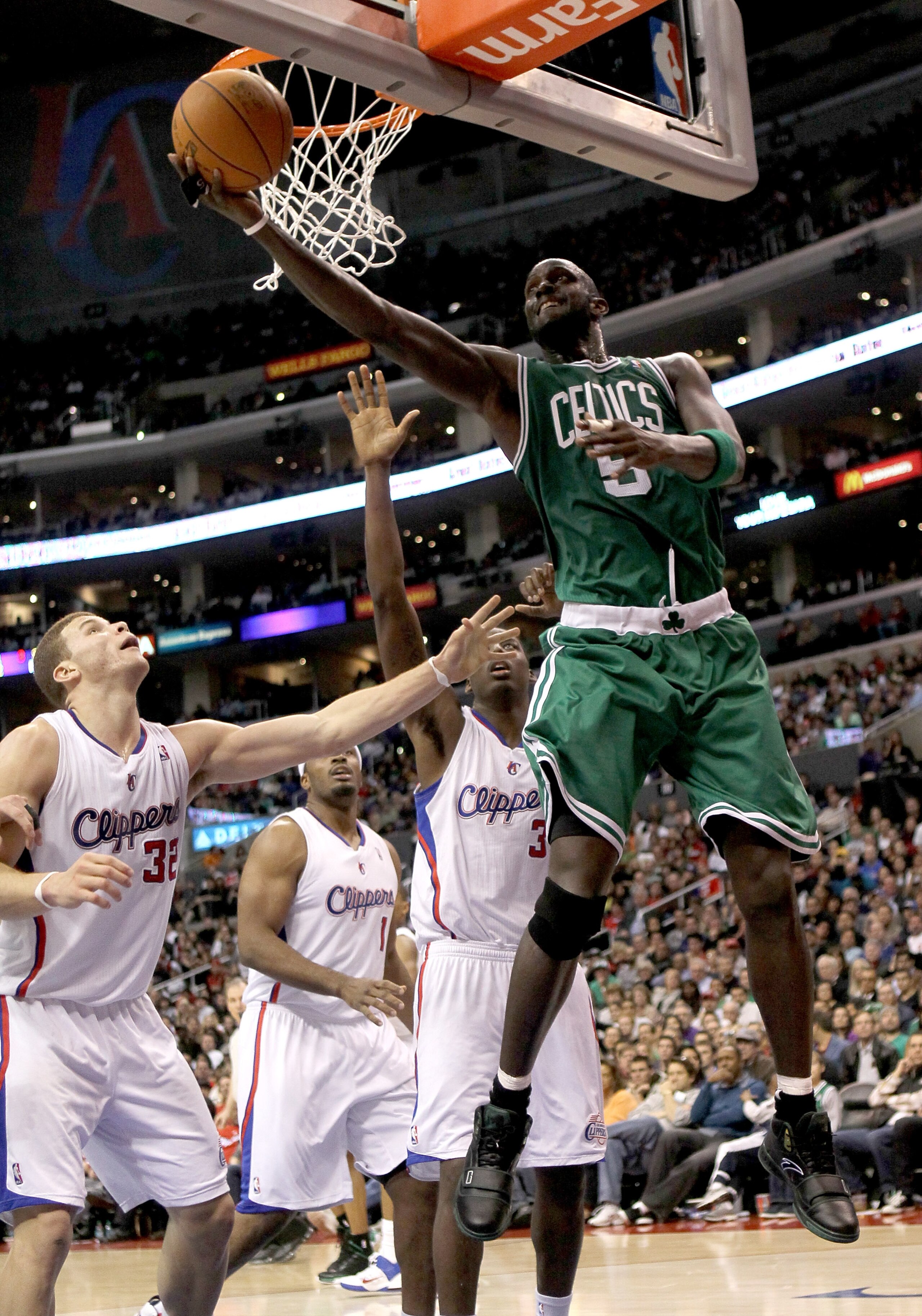 LOS ANGELES, CA - FEBRUARY 26:  Kevin Garnett #5 of the Boston Celtics shoots over Blake Griffin #32 of the Los Angeles Clippers at Staples Center on February 26, 2011  in Los Angeles, California.  The Celtics won 99-92.   NOTE TO USER: User expressly ack
