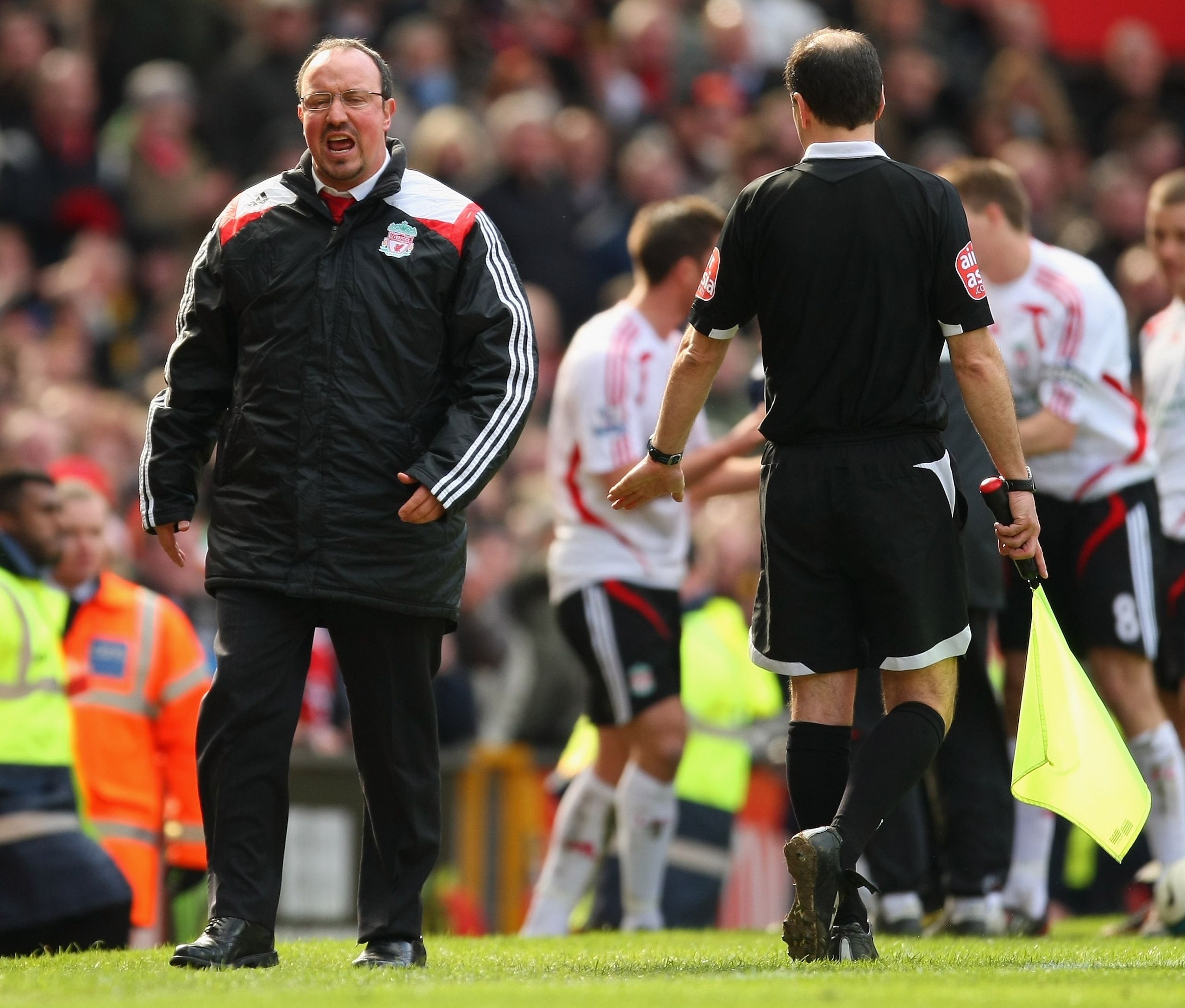 MANCHESTER, UNITED KINGDOM - MARCH 23:  Liverpool Manager Rafael Benitez reacts after Javier Mascherano of Liverpool is sent off during the Barclays Premier League match between Manchester United and Liverpool at Old Trafford on March 23, 2008 in Manchest
