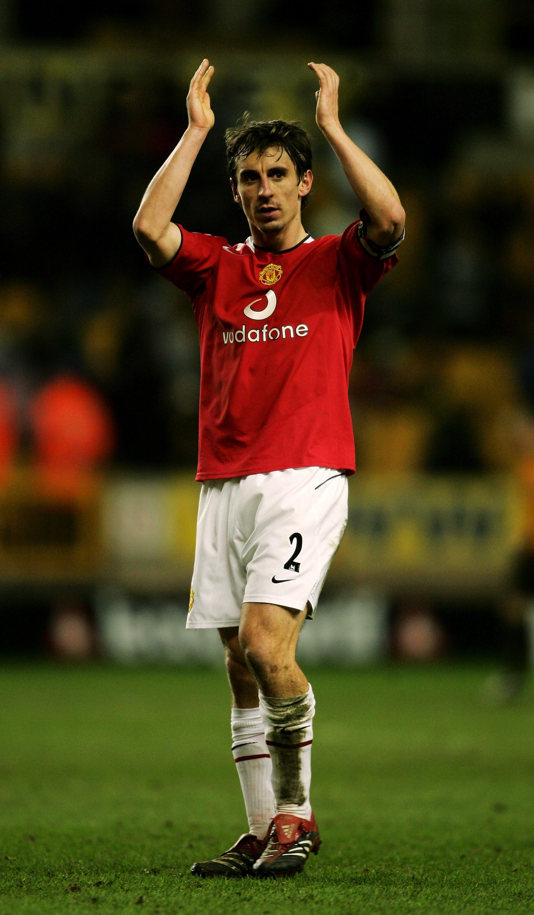 WOLVERHAMPTON, UNITED KINGDOM - JANUARY 29:  Gary Neville of Manchester United applauds the travelling fans following the FA Cup Fourth Round match between Wolverhampton Wanderers and Manchester United at Molineux on January 29, 2006 in Wolverhampton, Eng