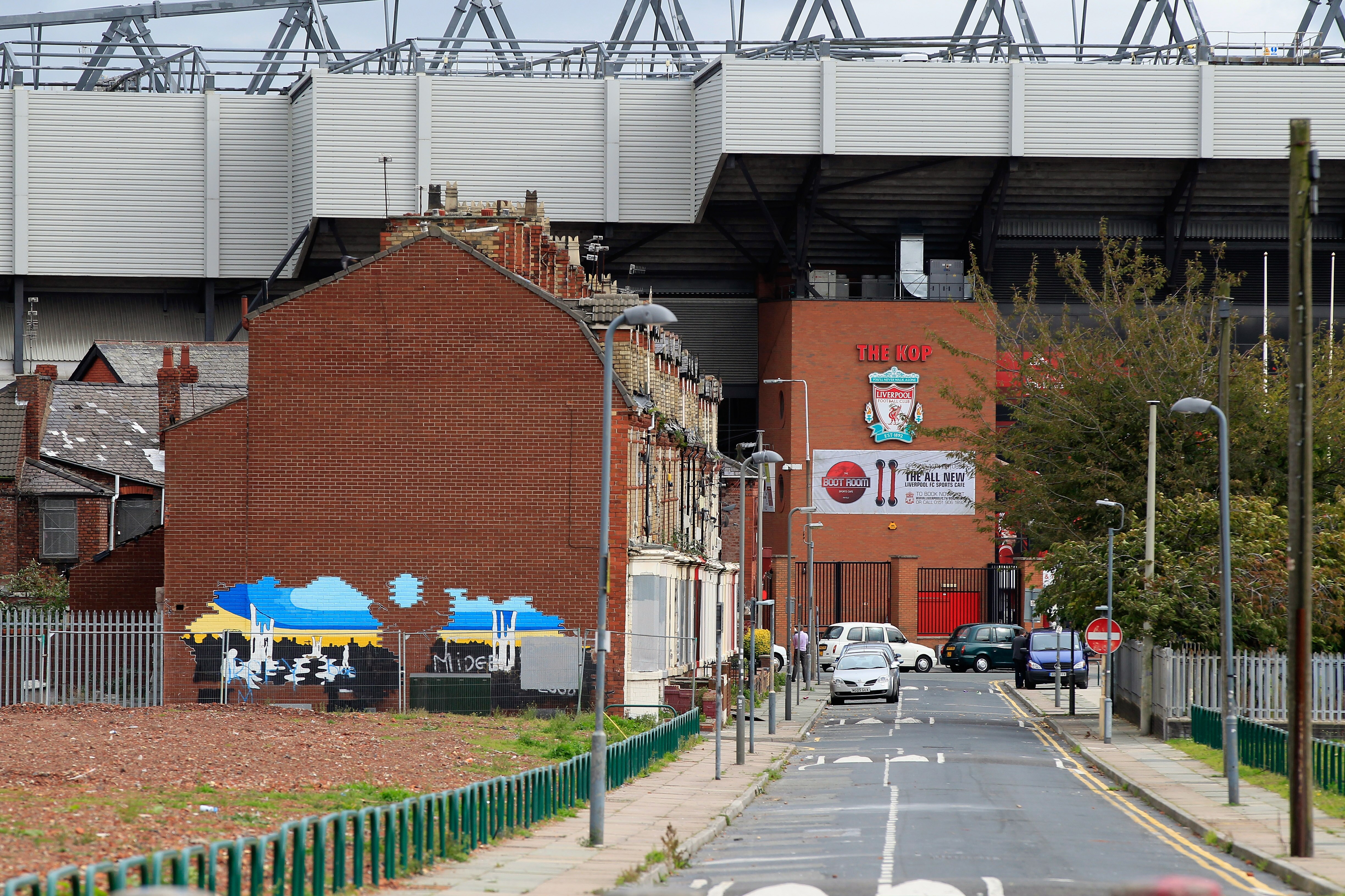 LIVERPOOL, ENGLAND - OCTOBER 15:  Anfield, the home of Liverpool Football Club, looms above terraced houses on October 15, 2010 in Liverpool, England. The future ownership of the famous football club had been subject to legal injunctions in the UK and USA