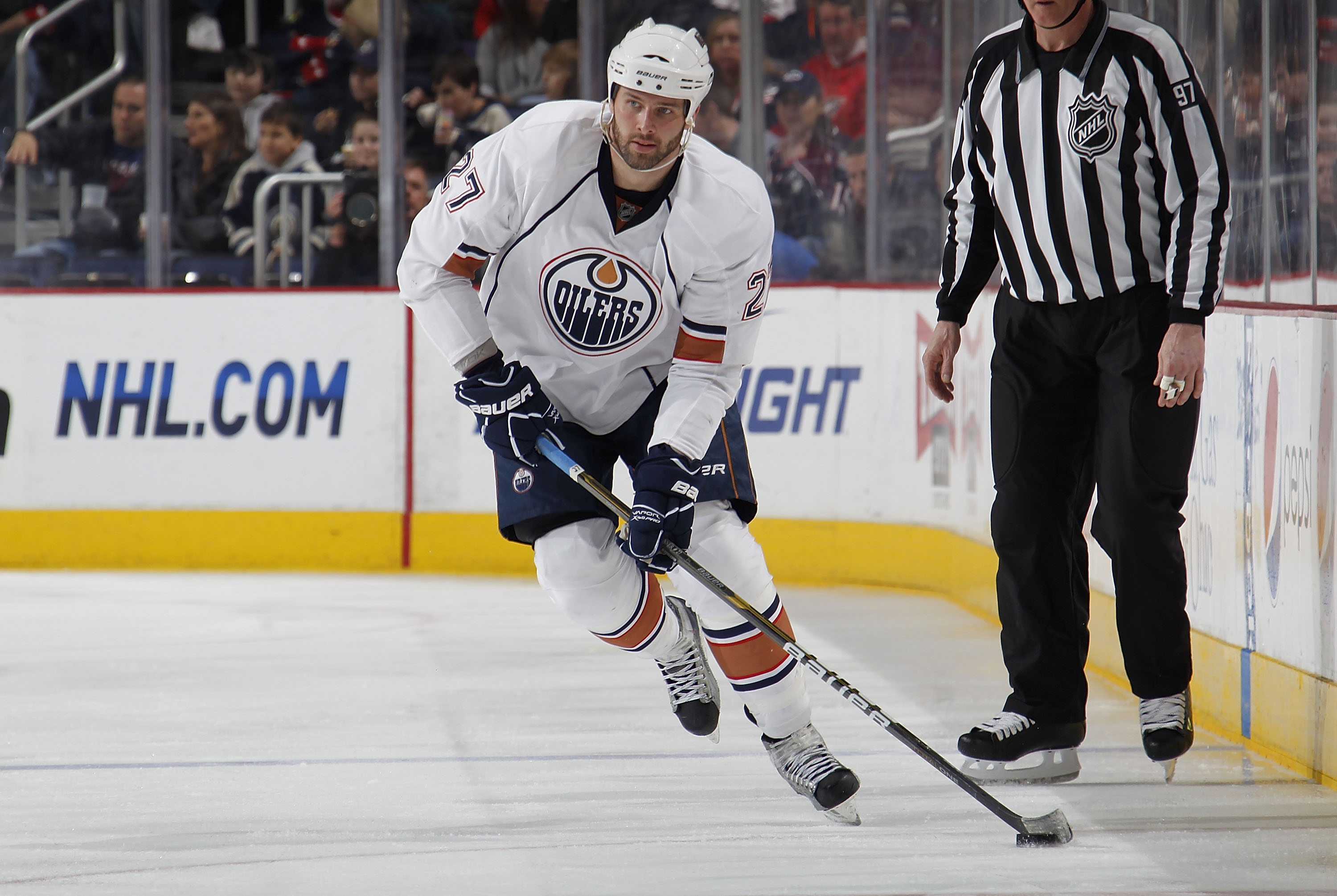 COLUMBUS, OH - FEBRUARY 05: Dustin Penner #27 of the Edmonton Oilers skates with the puck against the Columbus Blue Jackets at Nationwide Arena on February 5, 2011 in Columbus, Ohio.  (Photo by Gregory Shamus/Getty Images)