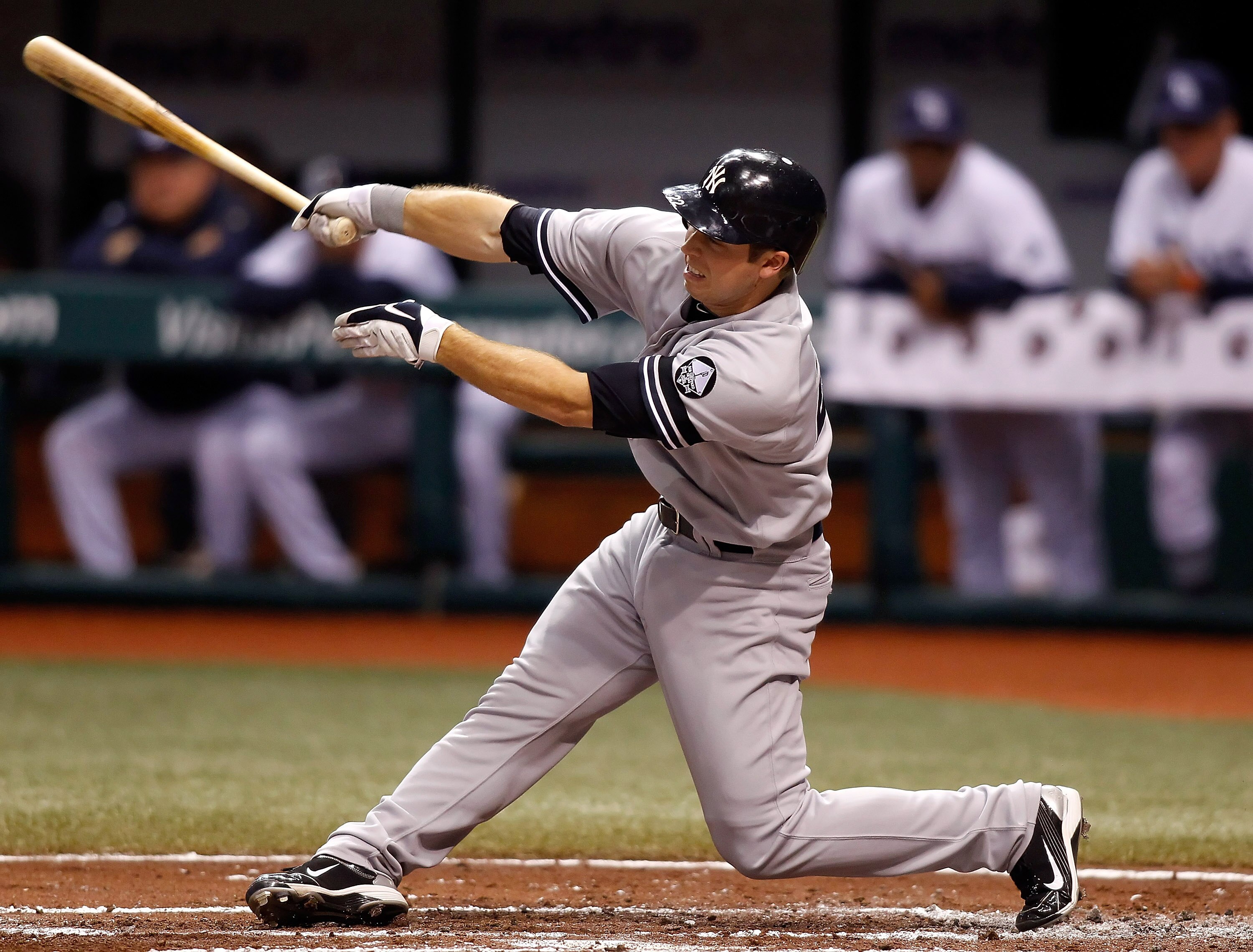 ST. PETERSBURG, FL - SEPTEMBER 15:  Colin Curtis #22 of the New York Yankees fouls off a pitch against the Tampa Bay Rays during the game at Tropicana Field on September 15, 2010 in St. Petersburg, Florida.  (Photo by J. Meric/Getty Images)
