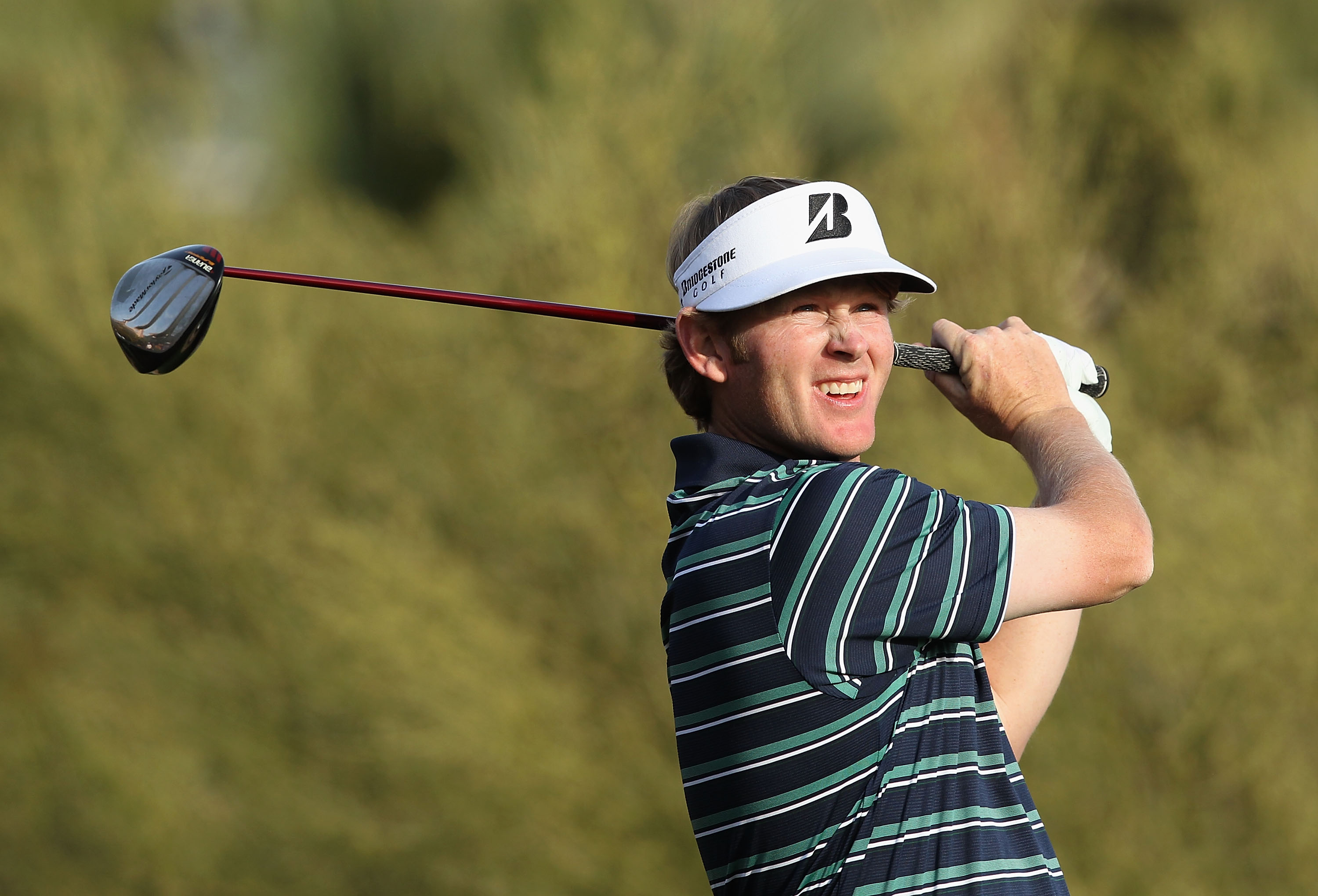 SCOTTSDALE, AZ - FEBRUARY 06:  Brandt Snedeker hits a tee shot on the fifth hole during the final round of the Waste Management Phoenix Open at TPC Scottsdale on February 6, 2011 in Scottsdale, Arizona.  (Photo by Christian Petersen/Getty Images)