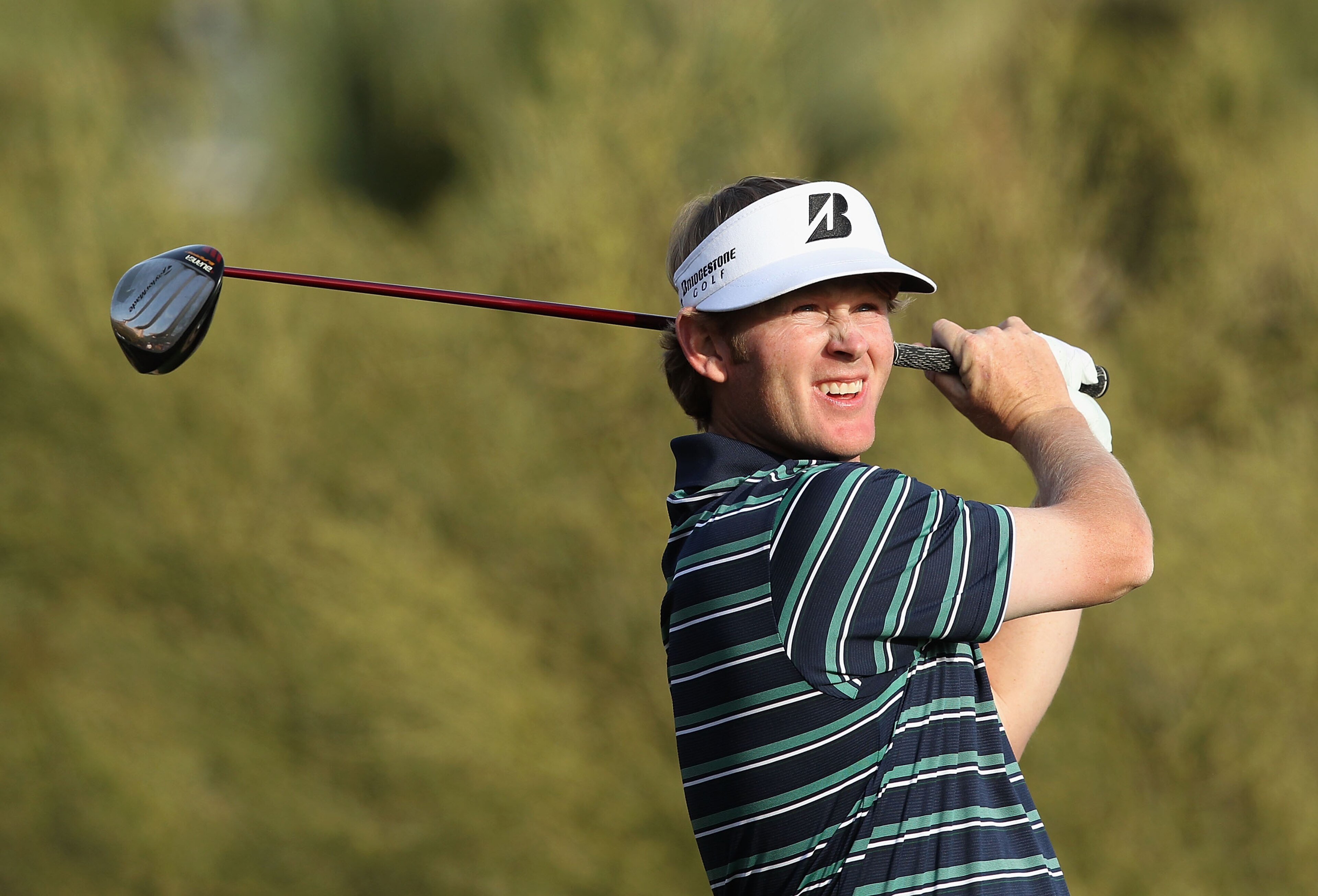 SCOTTSDALE, AZ - FEBRUARY 06:  Brandt Snedeker hits a tee shot on the fifth hole during the final round of the Waste Management Phoenix Open at TPC Scottsdale on February 6, 2011 in Scottsdale, Arizona.  (Photo by Christian Petersen/Getty Images)