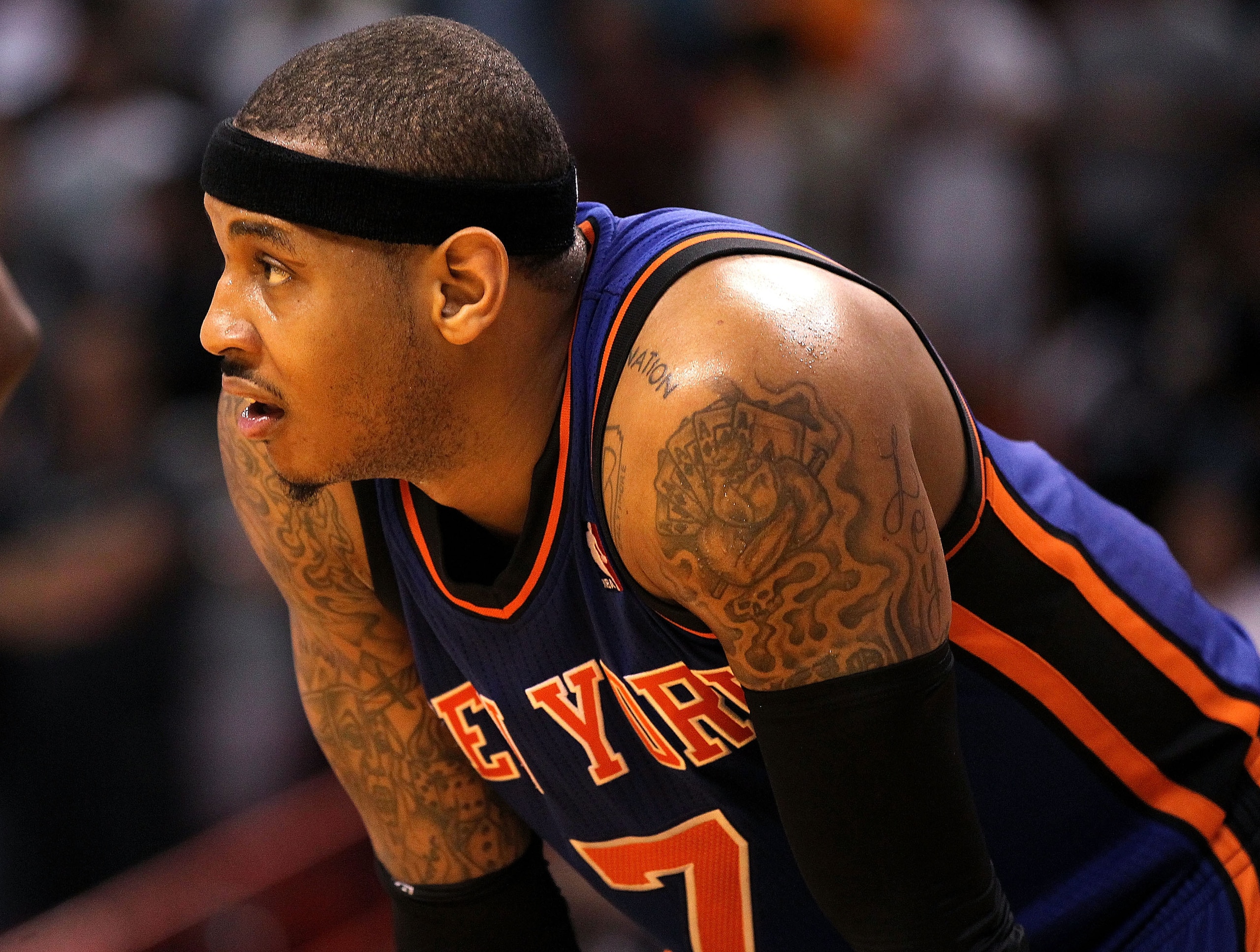 MIAMI, FL - FEBRUARY 27:  Carmelo Anthony #7 of the New York Knicks looks on during a foul shot during a game gainst the Miami Heat at American Airlines Arena on February 27, 2011 in Miami, Florida. NOTE TO USER: User expressly acknowledges and agrees tha