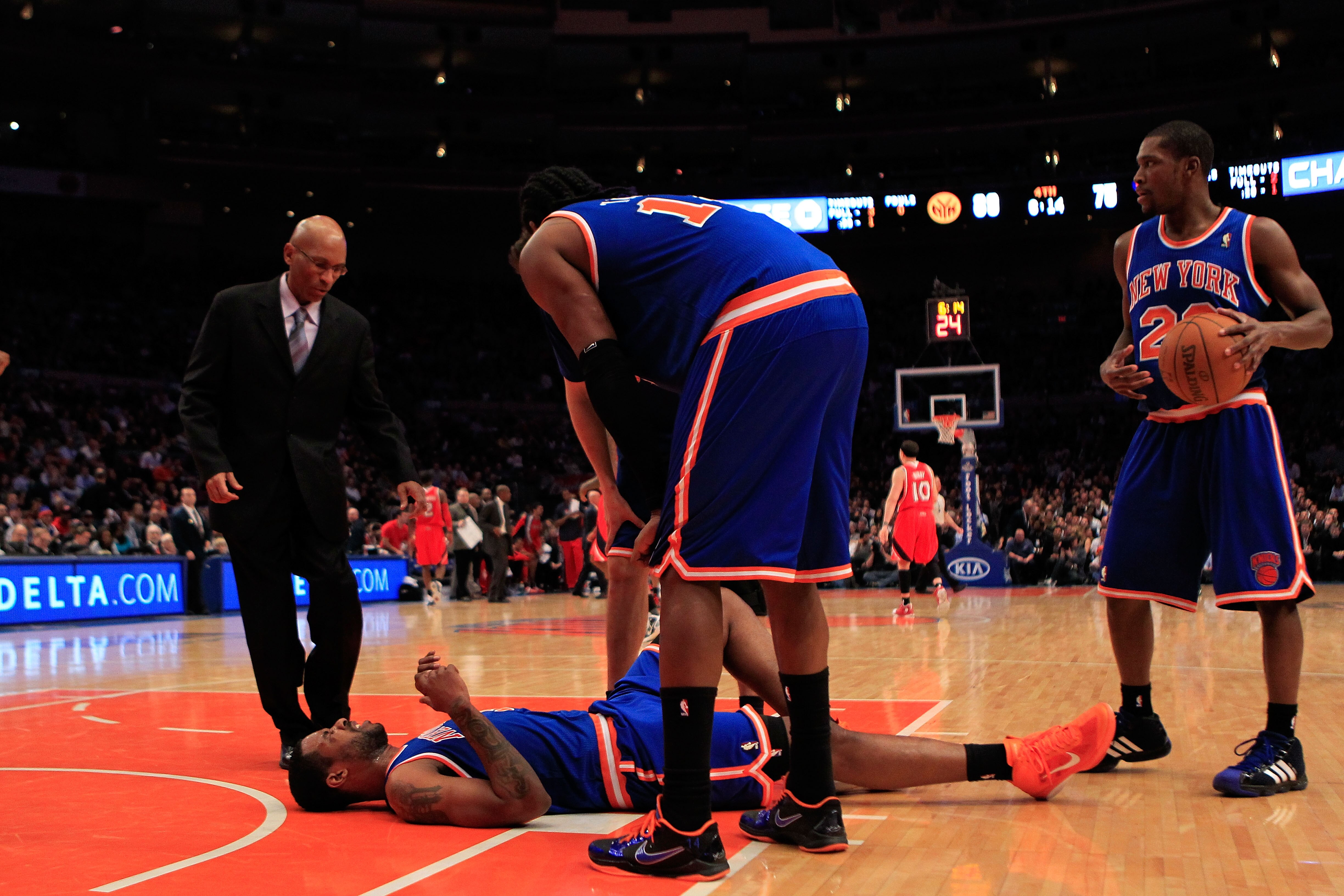 NEW YORK, NY - FEBRUARY 16:  Shawne Williams #3 of the New York Knicks lays injured on the floor against the Atlanta Hawks at Madison Square Garden on February 16, 2011 in New York City. NOTE TO USER: User expressly acknowledges and agrees that, by downlo