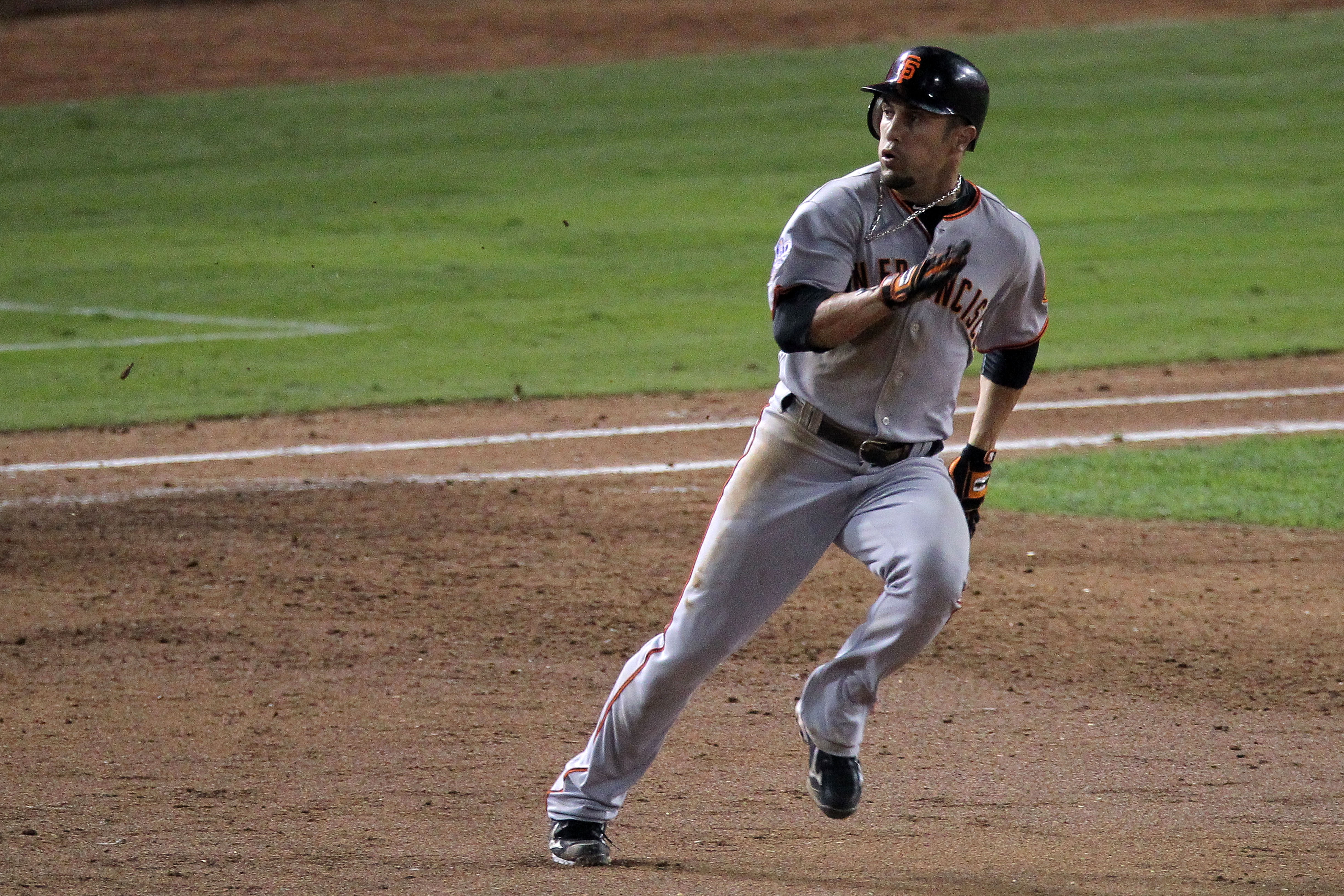 ARLINGTON, TX - OCTOBER 31:  Andres Torres #56 of the San Francisco Giants looks as he runs to second base after hitting a double to right field against the Texas Rangers in the top of the third inning of Game Four of the 2010 MLB World Series at Rangers