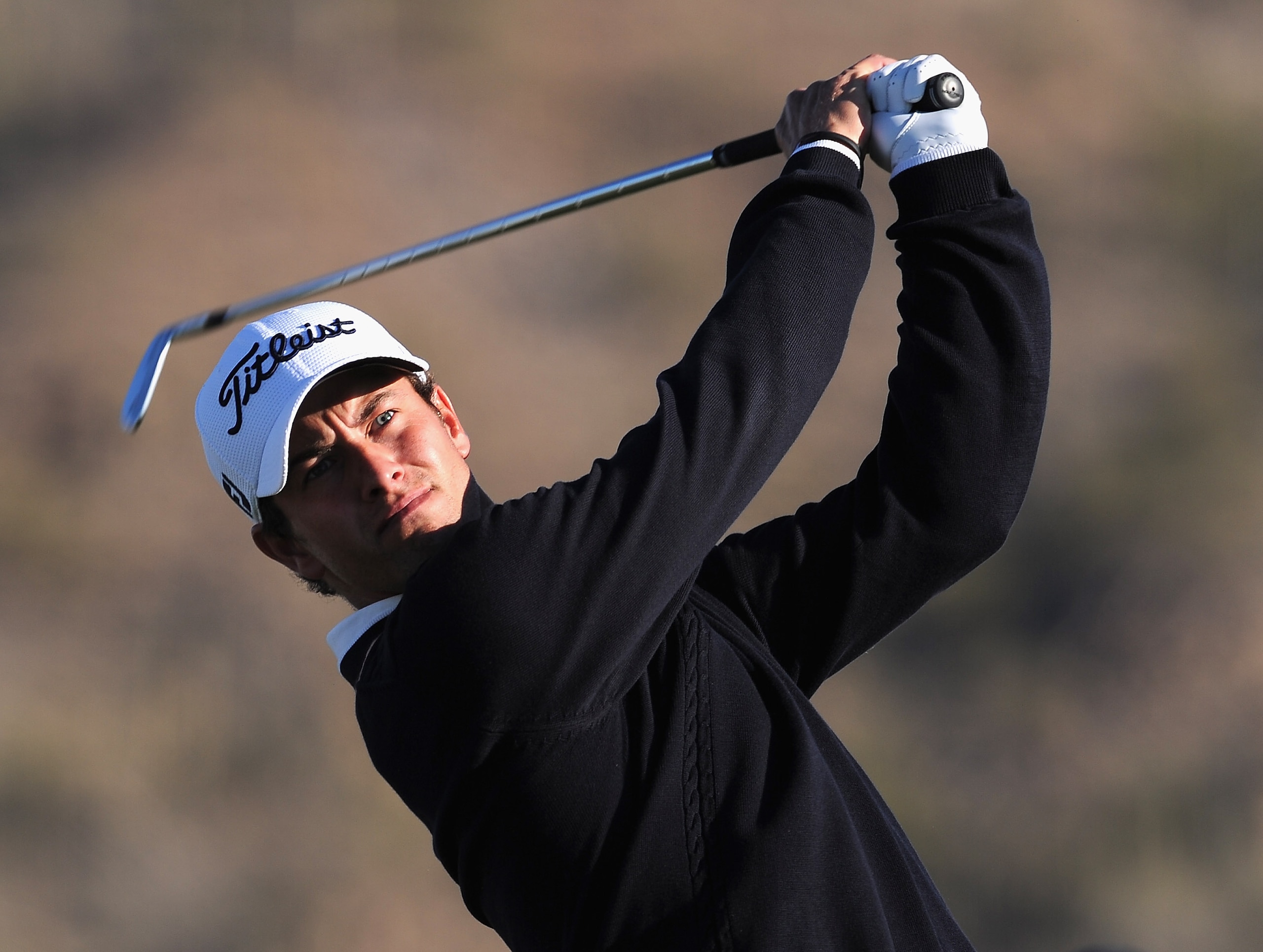 MARANA, AZ - FEBRUARY 22: Adam Scott of Australia plays a shot during practice prior to the start of the World Golf Championships-Accenture Match Play Championship held at The Ritz-Carlton Golf Club, Dove Mountain on February 22, 2011 in Marana, Arizona.