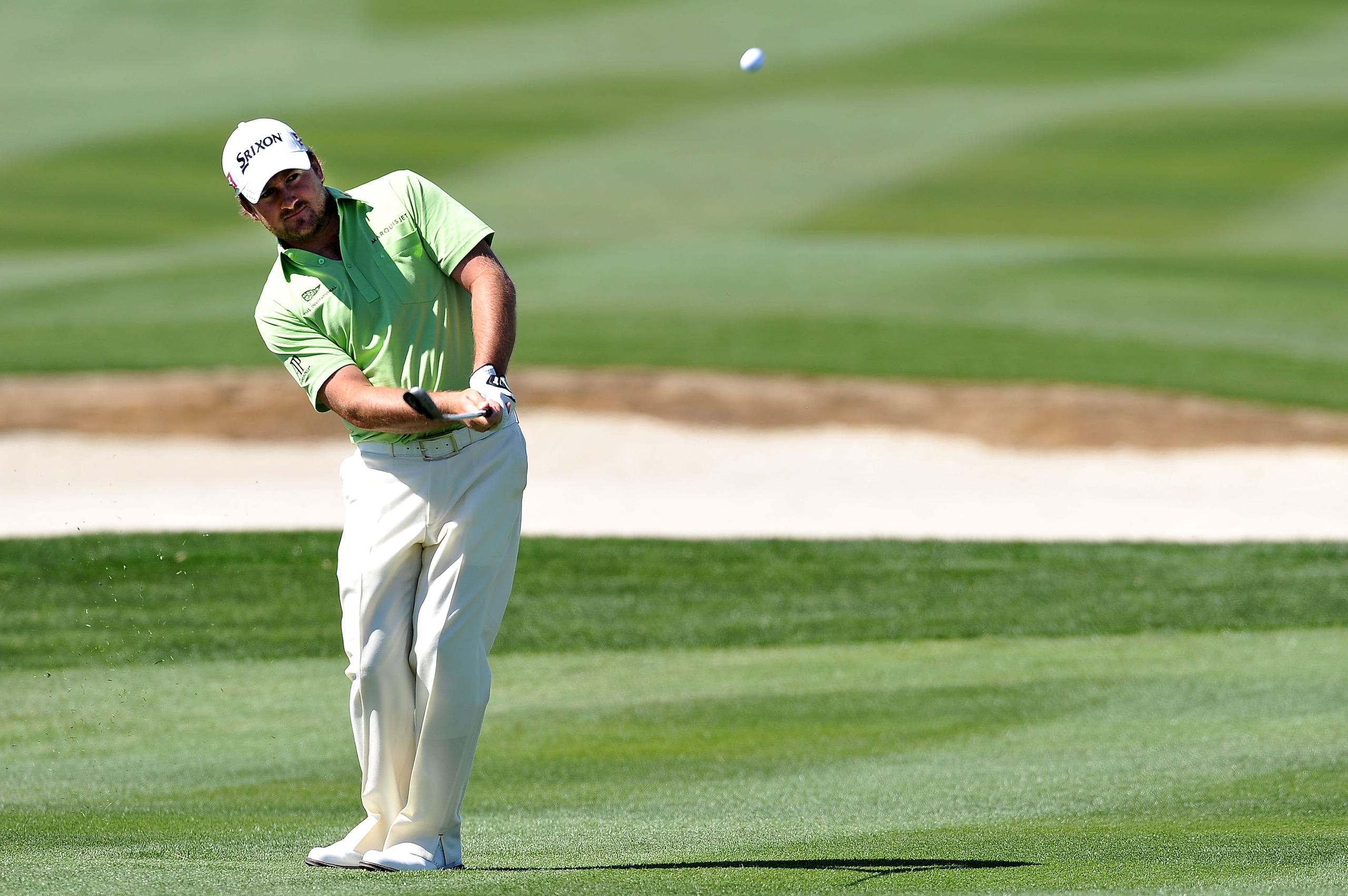 MARANA, AZ - FEBRUARY 25:  Graeme McDowell of Northern Ireland hits an approach shot on the eighth hole during the third round of the Accenture Match Play Championship at the Ritz-Carlton Golf Club on February 25, 2011 in Marana, Arizona.  (Photo by Stuar