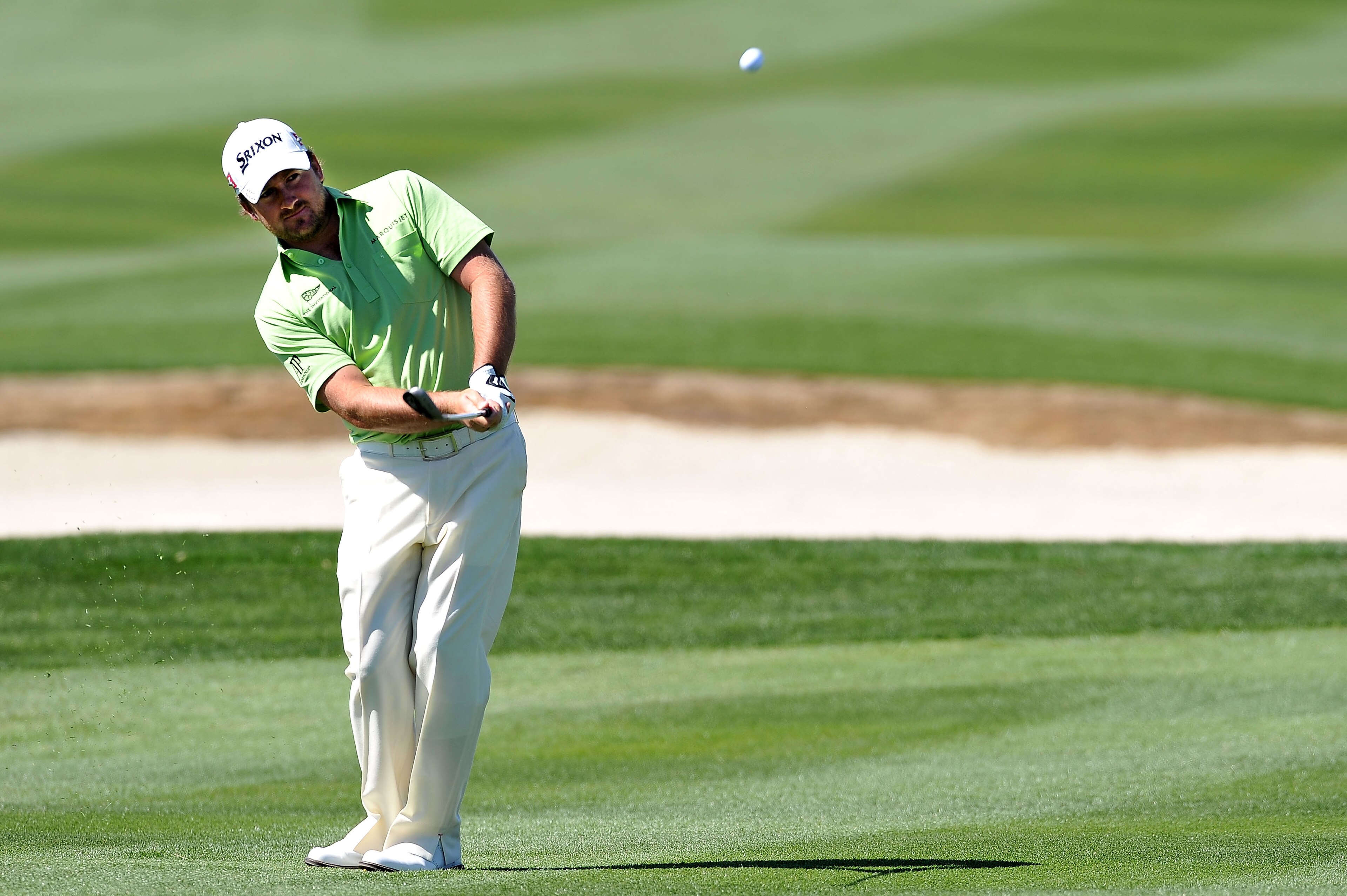 MARANA, AZ - FEBRUARY 25:  Graeme McDowell of Northern Ireland hits an approach shot on the eighth hole during the third round of the Accenture Match Play Championship at the Ritz-Carlton Golf Club on February 25, 2011 in Marana, Arizona.  (Photo by Stuar
