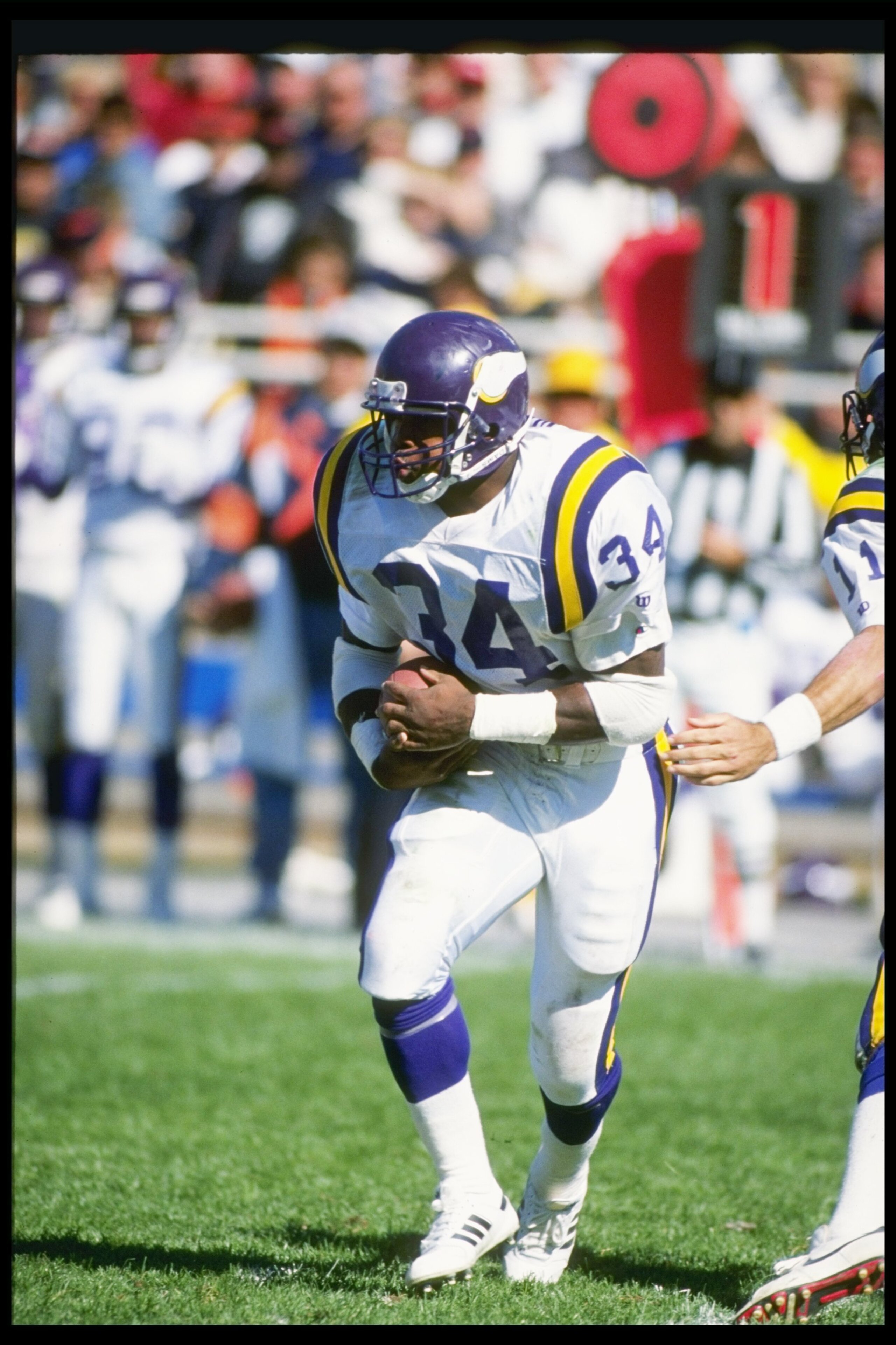 23 Sep 1990: Running back Herschel Walker of the Minnesota Vikings moves the ball during a game against the Chicago Bears at Soldier Field in Chicago, Illinois. The Bears won the game, 19-16.