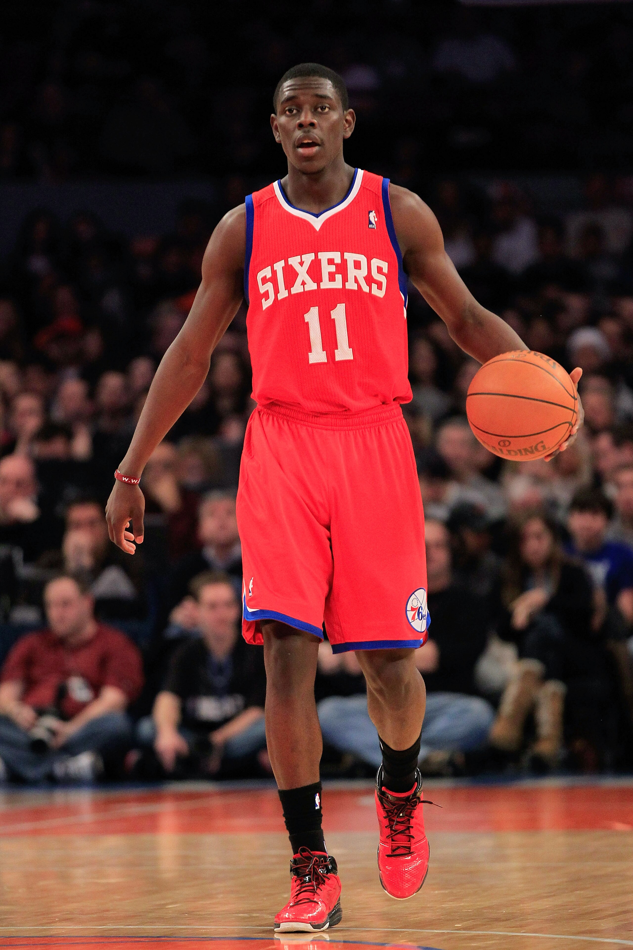 NEW YORK, NY - FEBRUARY 06:  Jrue Holiday #11 of the Philadelphia 76ers dribbles the ball against the New York Knicks at Madison Square Garden on February 6, 2011 in New York City. NOTE TO USER: User expressly acknowledges and agrees that, by downloading 