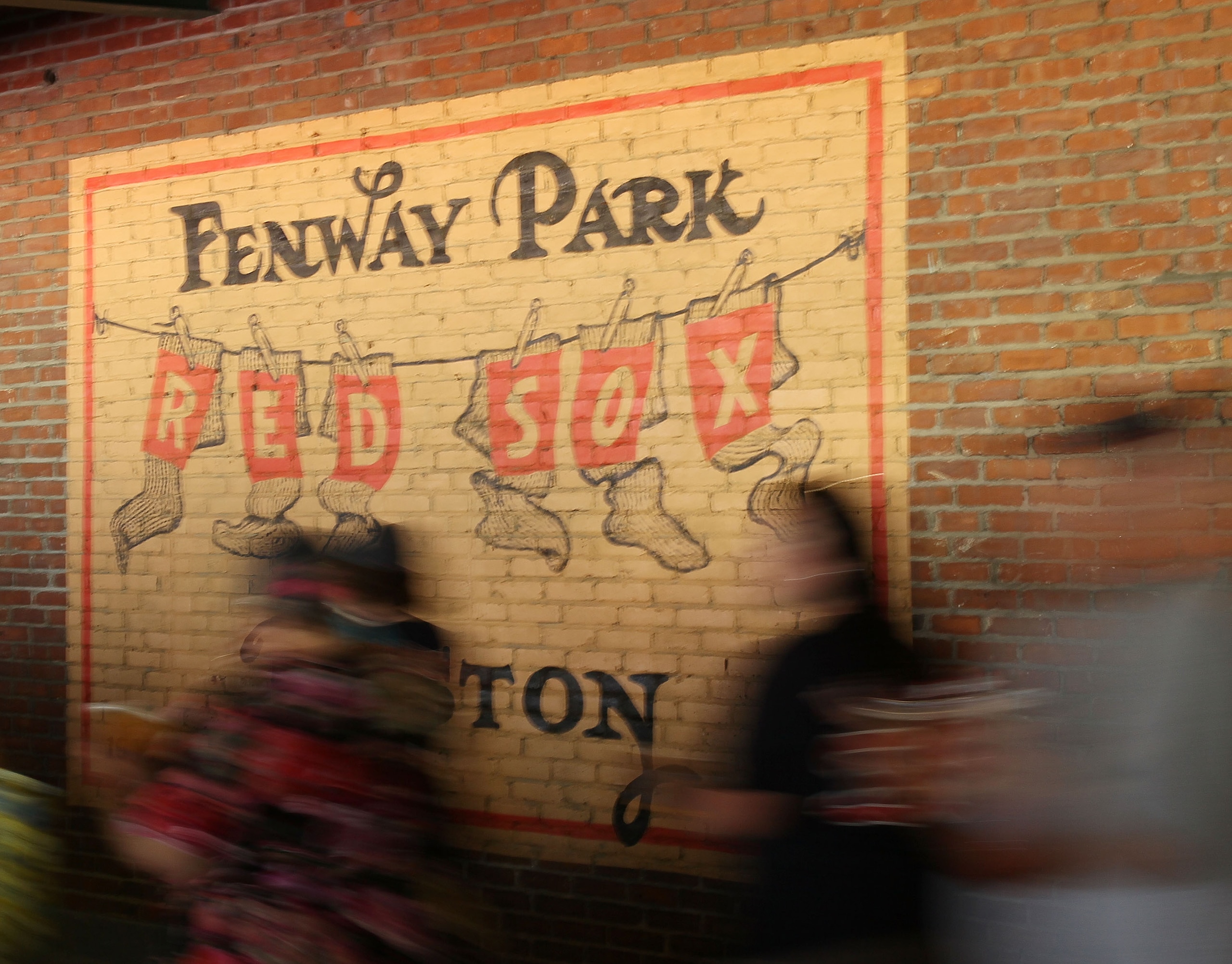 BOSTON - AUGUST 01:  Fans head to their seats before the game between the Detroit Tigers and the Boston Red Sox on August 1, 2010 at Fenway Park in Boston, Massachusetts.  (Photo by Elsa/Getty Images)