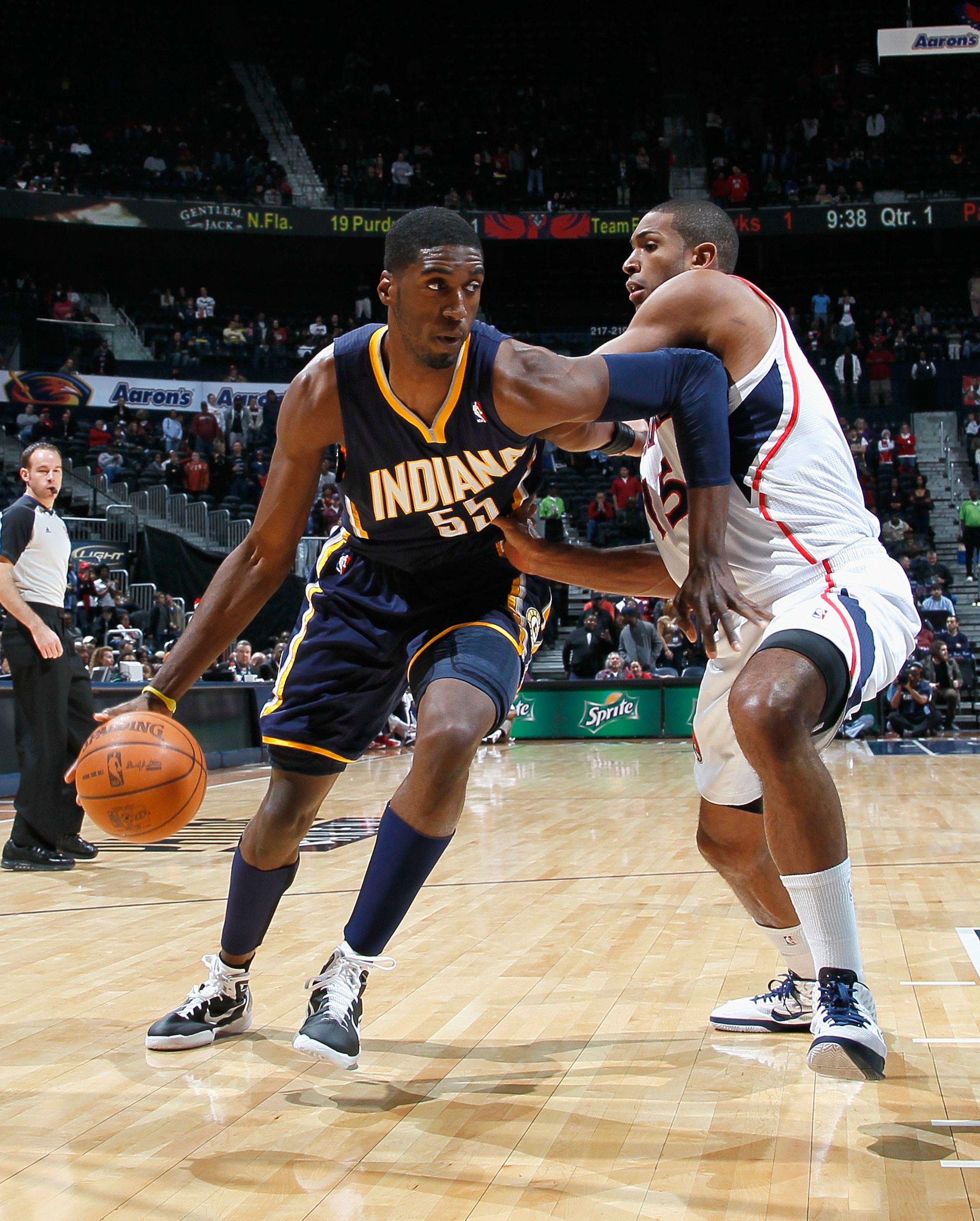 ATLANTA, GA - DECEMBER 11:  Roy Hibbert #55 of the Indiana Pacers against Al Horford #15 of the Atlanta Hawks at Philips Arena on December 11, 2010 in Atlanta, Georgia.  NOTE TO USER: User expressly acknowledges and agrees that, by downloading and/or usin