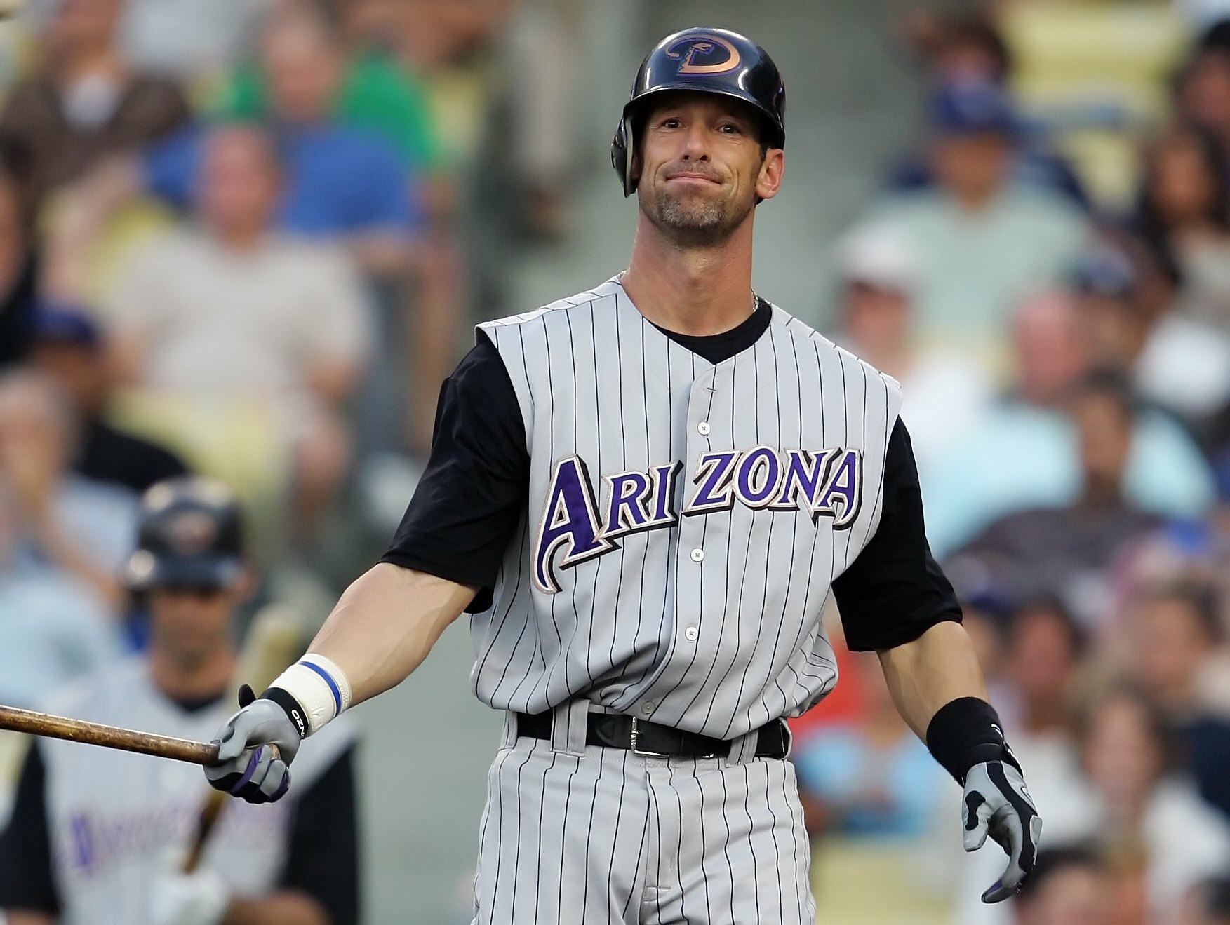 LOS ANGELES - JULY 3:   Luis Gonzalez #20 of the Arizona Diamondbacks reacts to a strike while at bat against the Los Angeles Dodgers on July 3, 2006 at Dodger Stadium in Los Angeles, California.  (Photo by Lisa Blumenfeld/Getty Images)