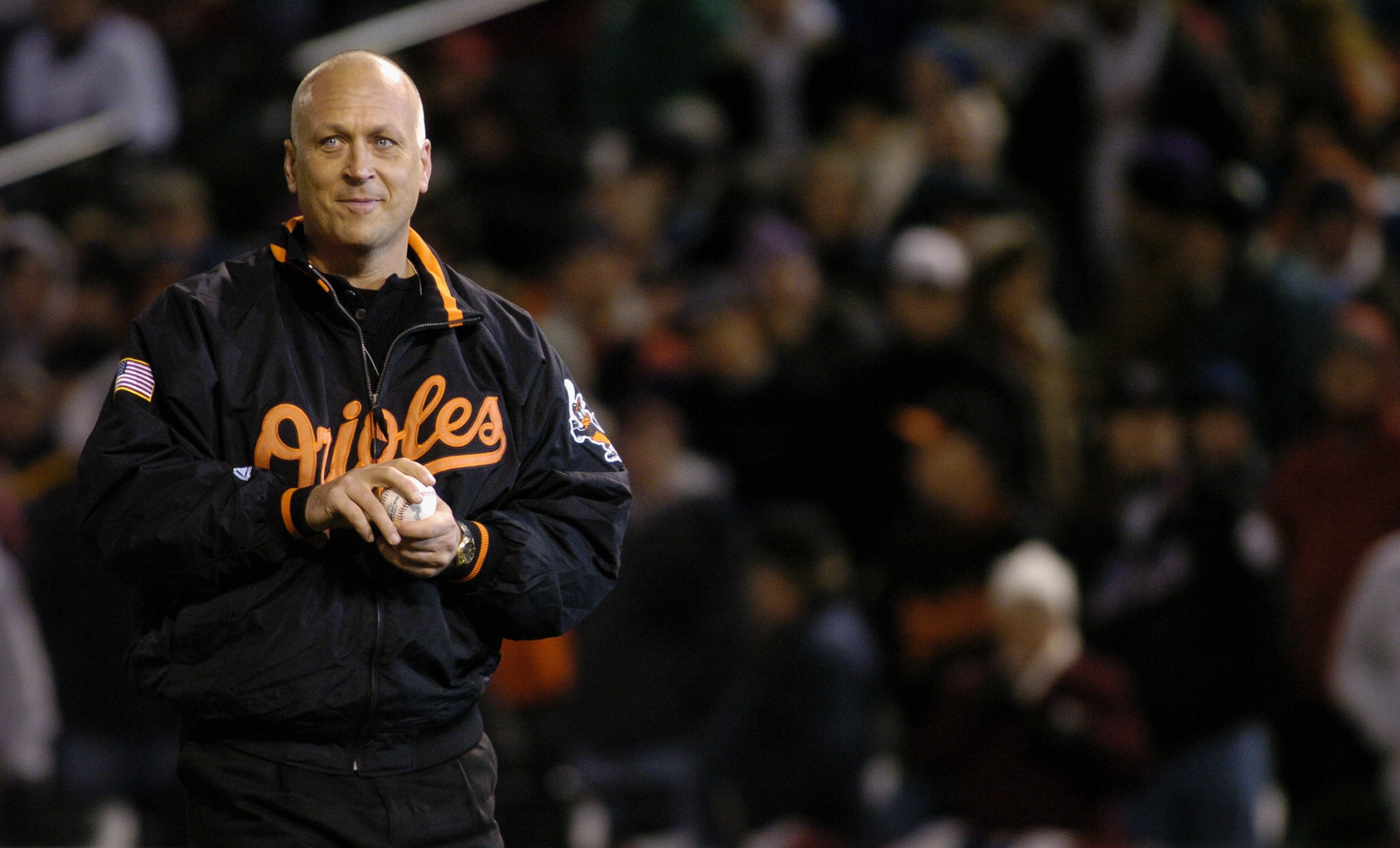 BALTIMORE, MD - APRIL 4:  Baseball legend Cal Ripken Jr. of the Baltimore Orioles throws out the ceremonial first pitch before the game between the Orioles and the Boston Red Sox on April 4, 2004 at Camden Yards in Baltimore, Maryland.  The Orioles won 7-