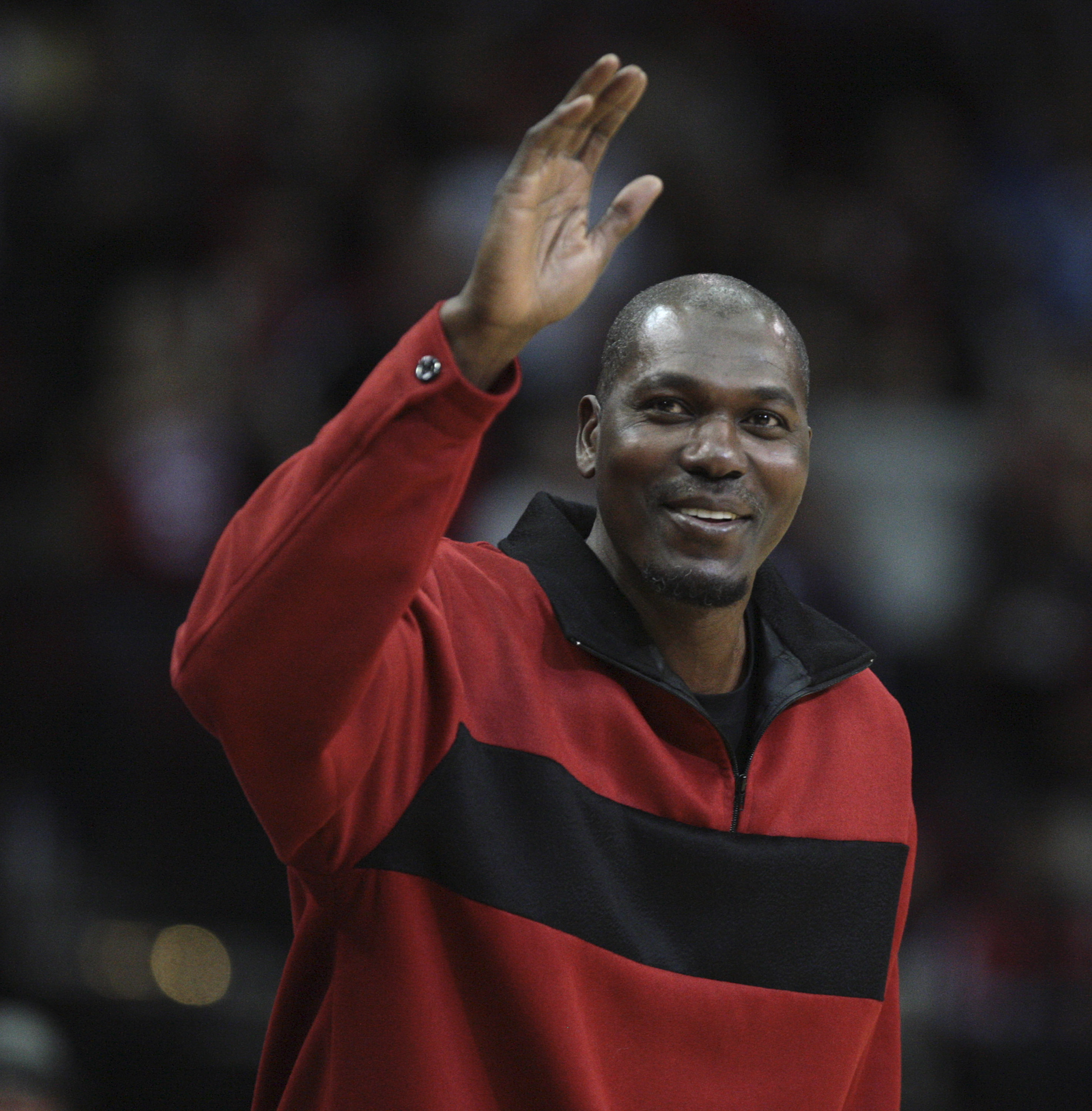 HOUSTON - DECEMBER 29:  Former Houston Rockets Hakeem Olajuwon waves to the crowd as he is introduced to the crowd at Toyota Center on December 29, 2010 in Houston, Texas.  NOTE TO USER: User expressly acknowledges and agrees that, by downloading and or u