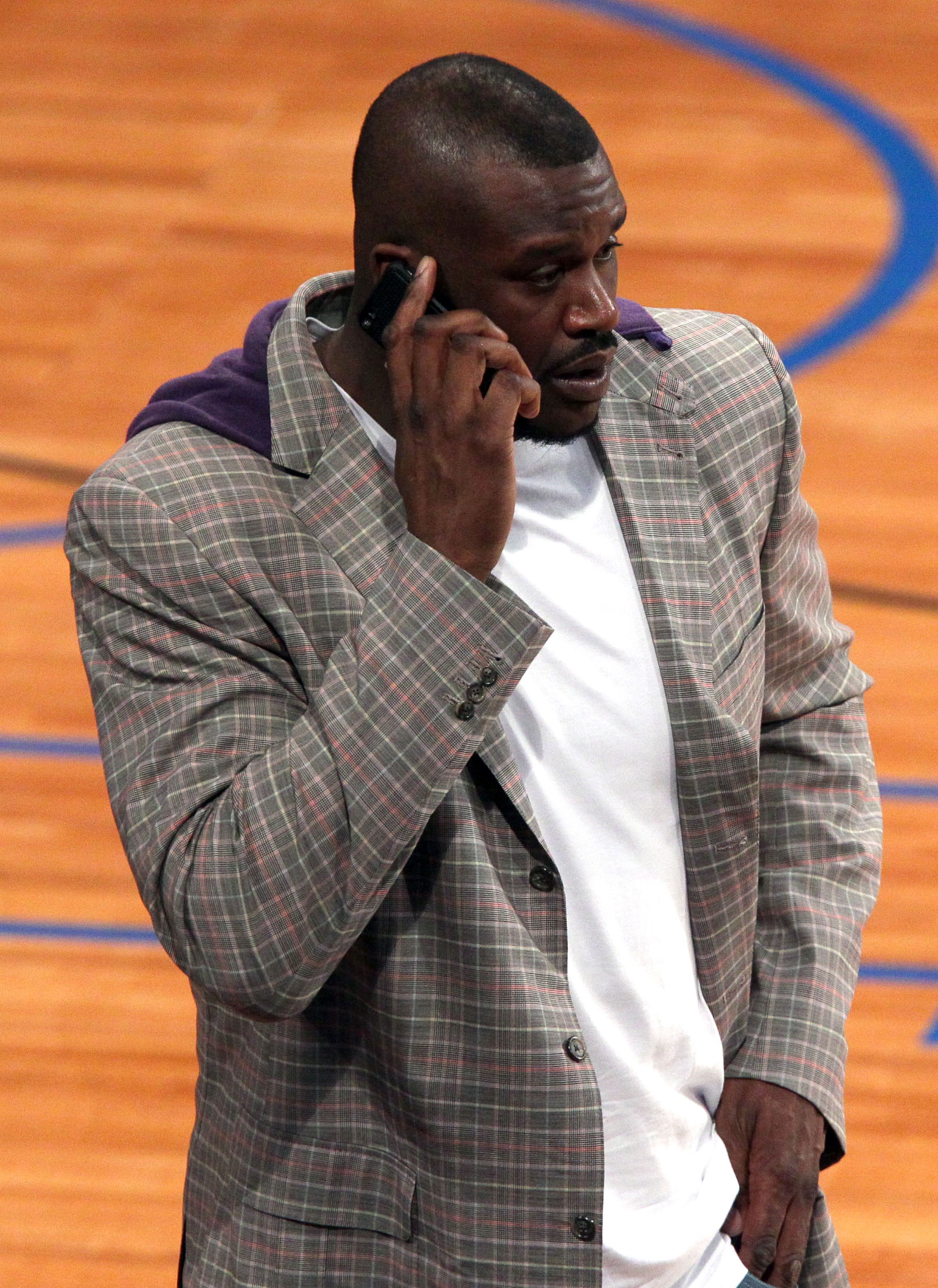 LOS ANGELES, CA - FEBRUARY 19:  Shaquille O'Neal of the Boston Celtics talks on his phone during NBA All-Star Saturday night presented by State Farm at Staples Center on February 19, 2011 in Los Angeles, California.  (Photo by Noel Vasquez/Getty Images)