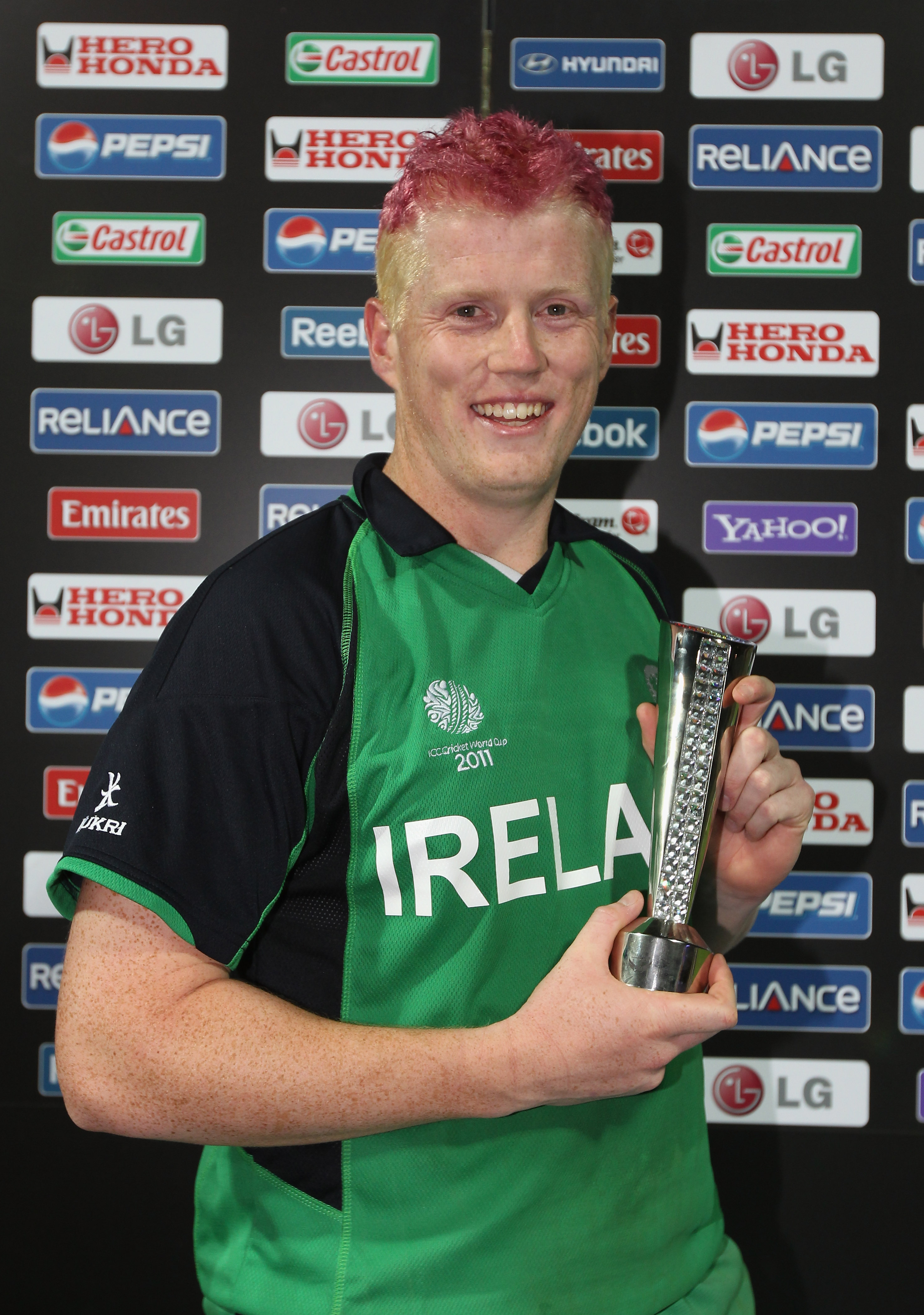 BANGALORE, INDIA - MARCH 02:  Kevin O'Brien of Ireland poses with the man of the match trophy during the 2011 ICC World Cup Group B match between England and Ireland at the M. Chinnaswamy Stadium on March 2, 2011 in Bangalore, India.  (Photo by Tom Shaw/G