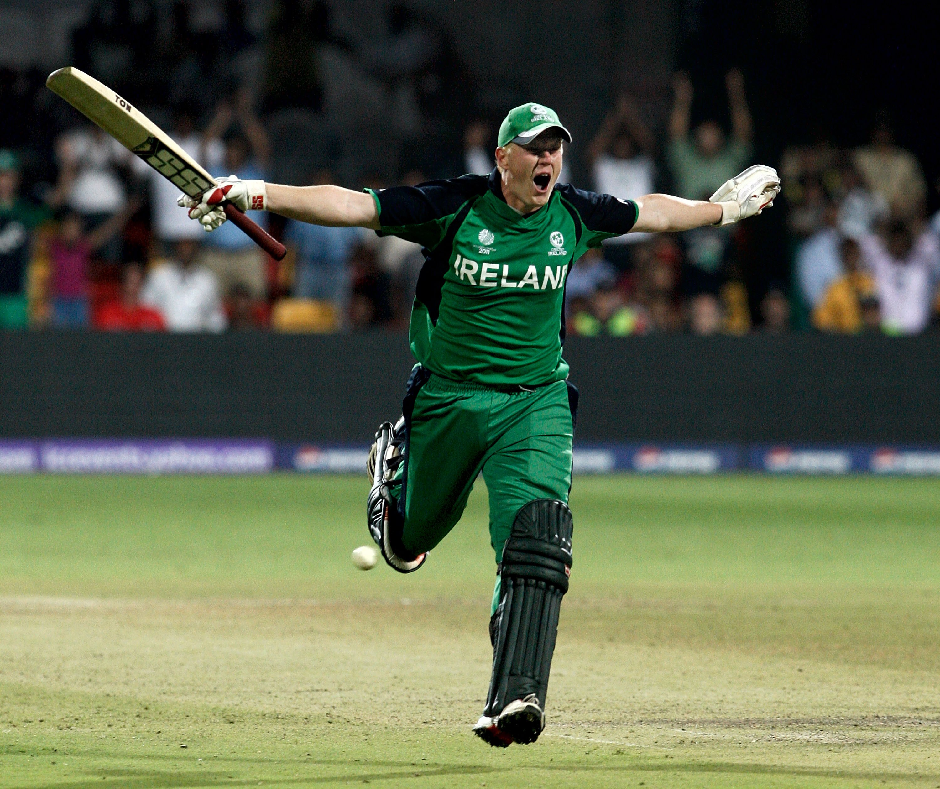 BANGALORE, INDIA - MARCH 02:  Kevin O'Brien of Ireland celebrates scoring a century batting against England in the Group B  2011 ICC World Cup match between England and Ireland at M. Chinnaswamy Stadium on March 2, 2011 in Bangalore, India.  (Photo by Gra