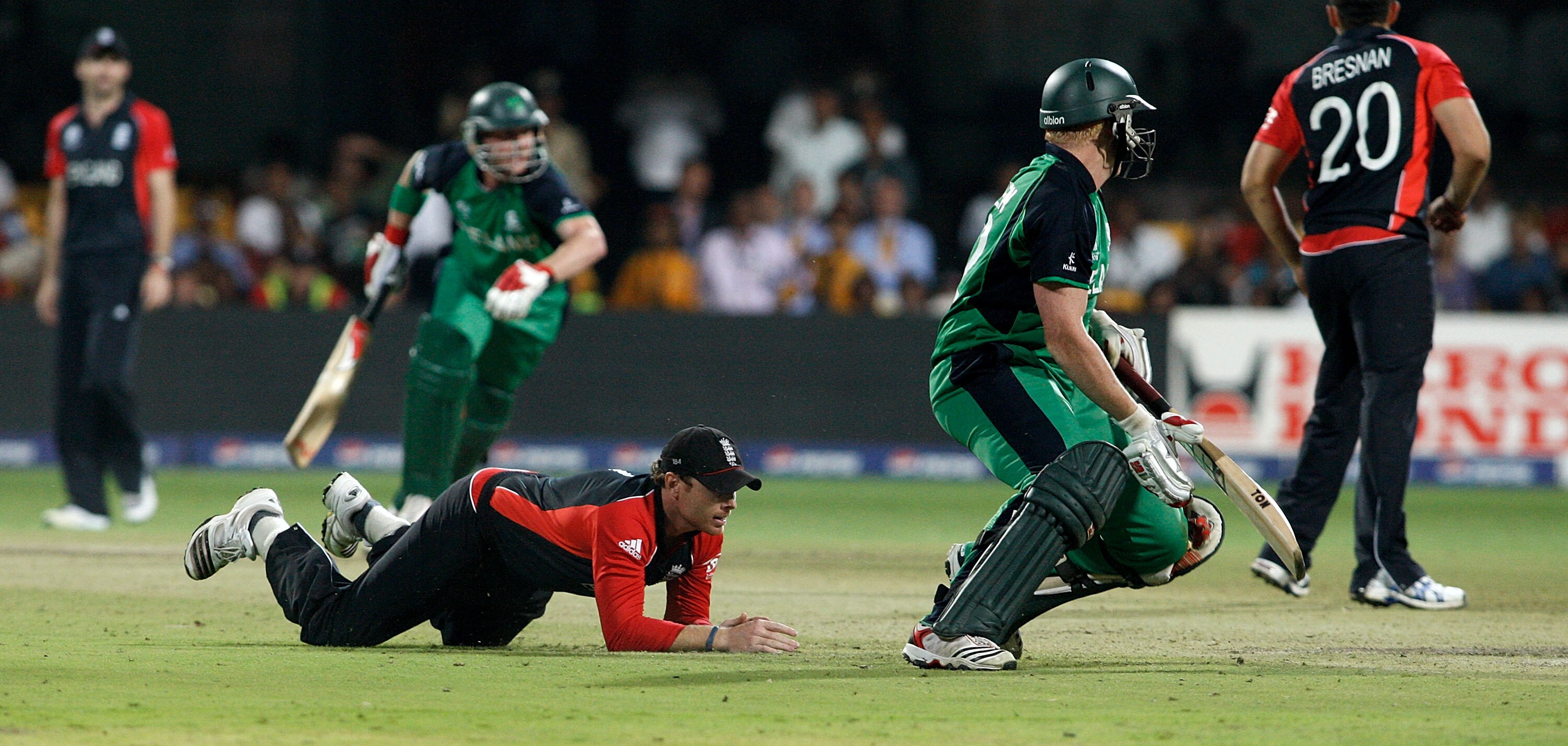 BANGALORE, INDIA - MARCH 02: Ian Bell of England attempts a run out Kevin O'Brien of Ireland  in the Group B  2011 ICC World Cup match between England and Ireland at M. Chinnaswamy Stadium on March 2, 2011 in Bangalore, India.  (Photo by Graham Crouch/Get