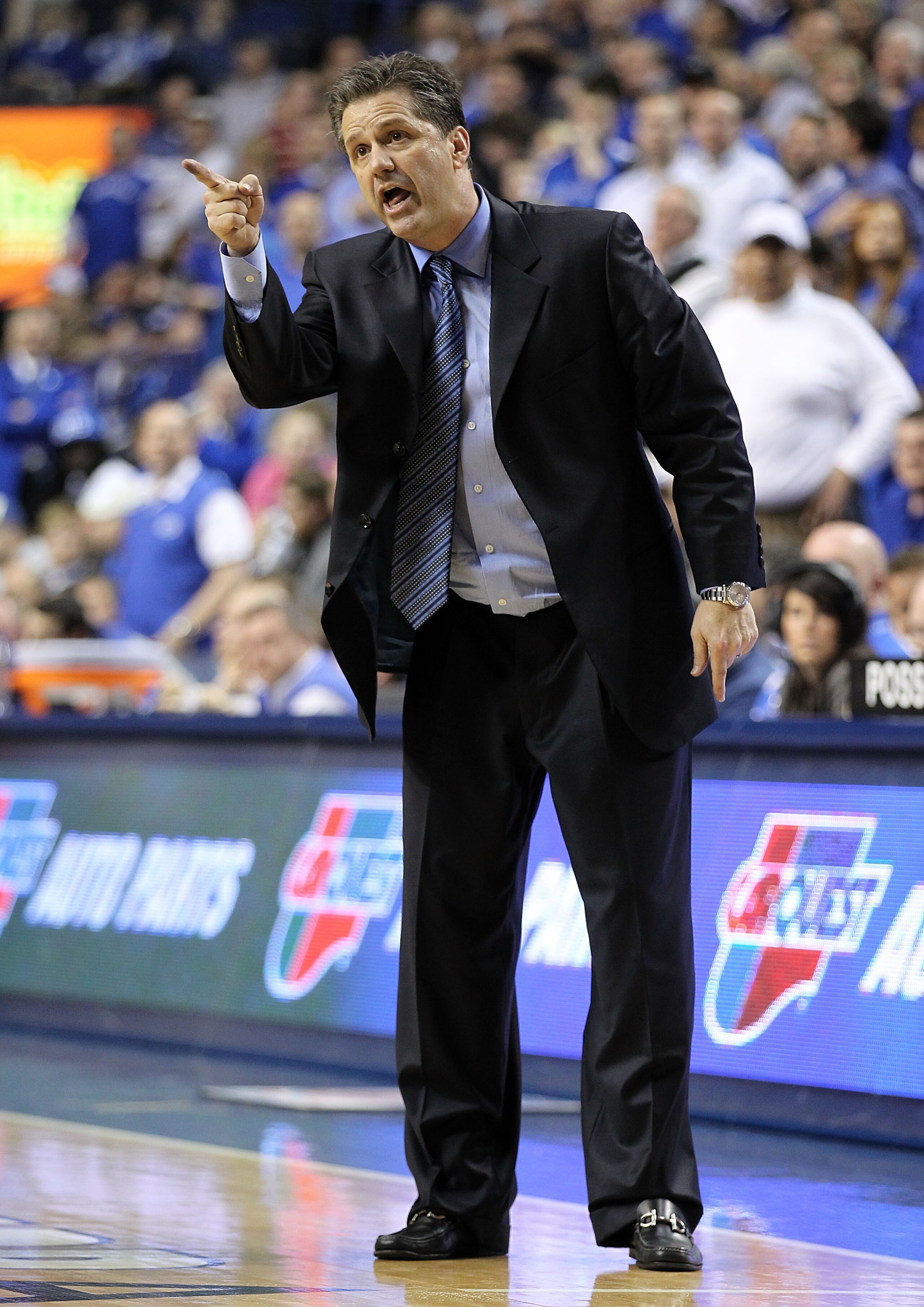 LEXINGTON, KY - MARCH 01:  John Calipari the Head Coach of the Kentucky Wildcats gives instructions to his team during the SEC game against the Vanderbilt Commodores at Rupp Arena on March 1, 2011 in Lexington, Kentucky.  (Photo by Andy Lyons/Getty Images