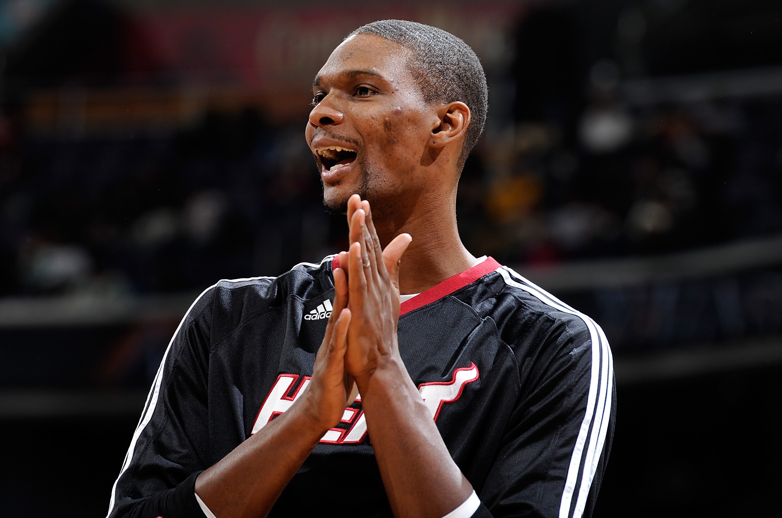 WASHINGTON, DC - DECEMBER 18:  Chris Bosh #1 of the Miami Heat warms up before the game against the Washington Wizards at the Verizon Center on December 18, 2010 in Washington, DC. NOTE TO USER: User expressly acknowledges and agrees that, by downloading