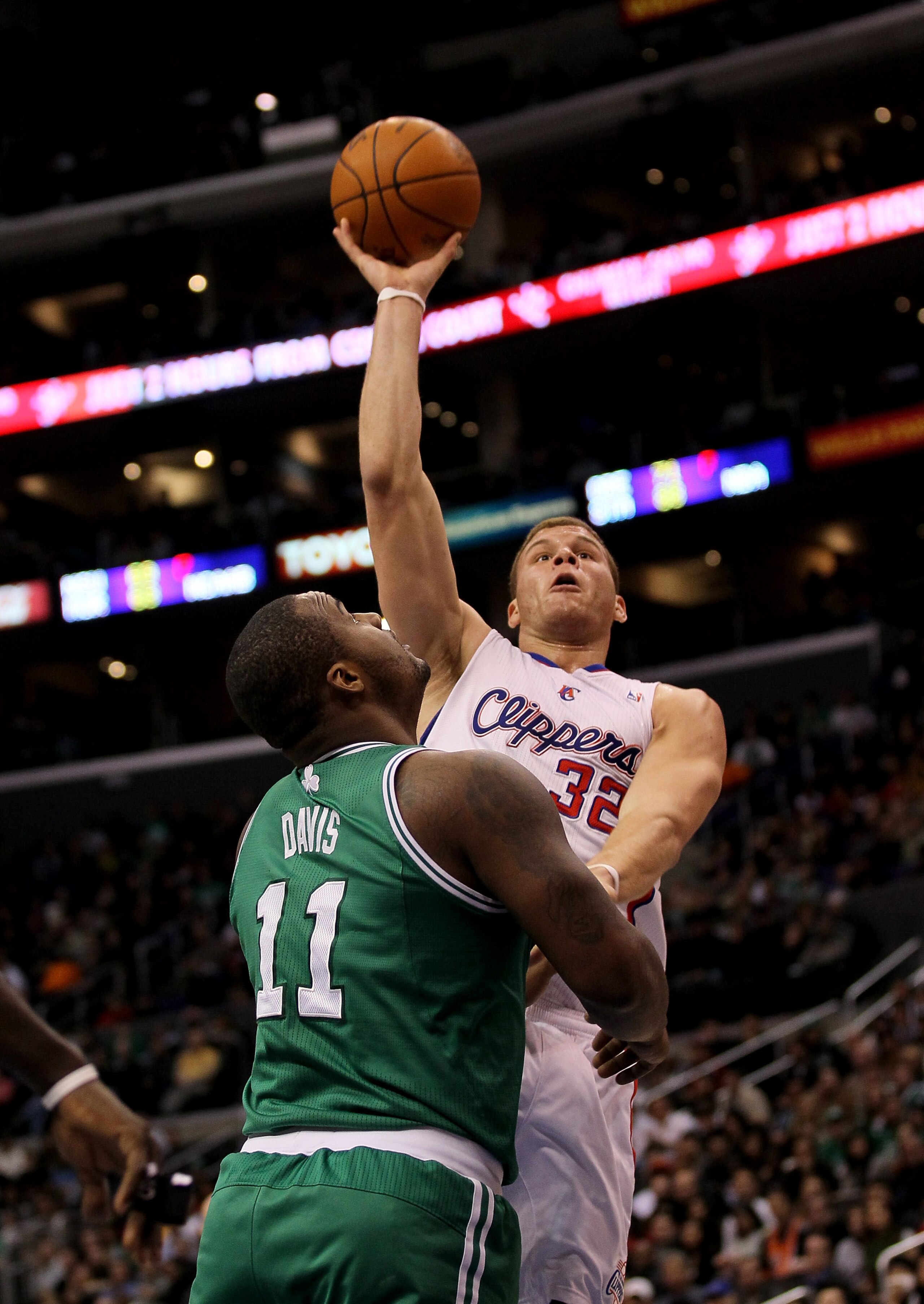 LOS ANGELES, CA - FEBRUARY 26:  Blake Griffin #32 of the Los Angeles Clippers shoots over Glen Davis #11 of the Boston Celtics at Staples Center on February 26, 2011  in Los Angeles, California. The Celtics won 99-92.  NOTE TO USER: User expressly acknowl